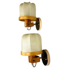 Pair of articulated "Cocoon" wall lights, resin and pine, Italy, 1970's