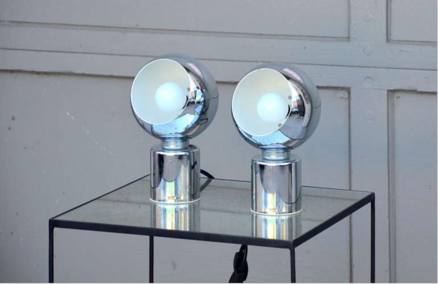 Pair of articulated globe spotlights by Reggiani Lampadari.