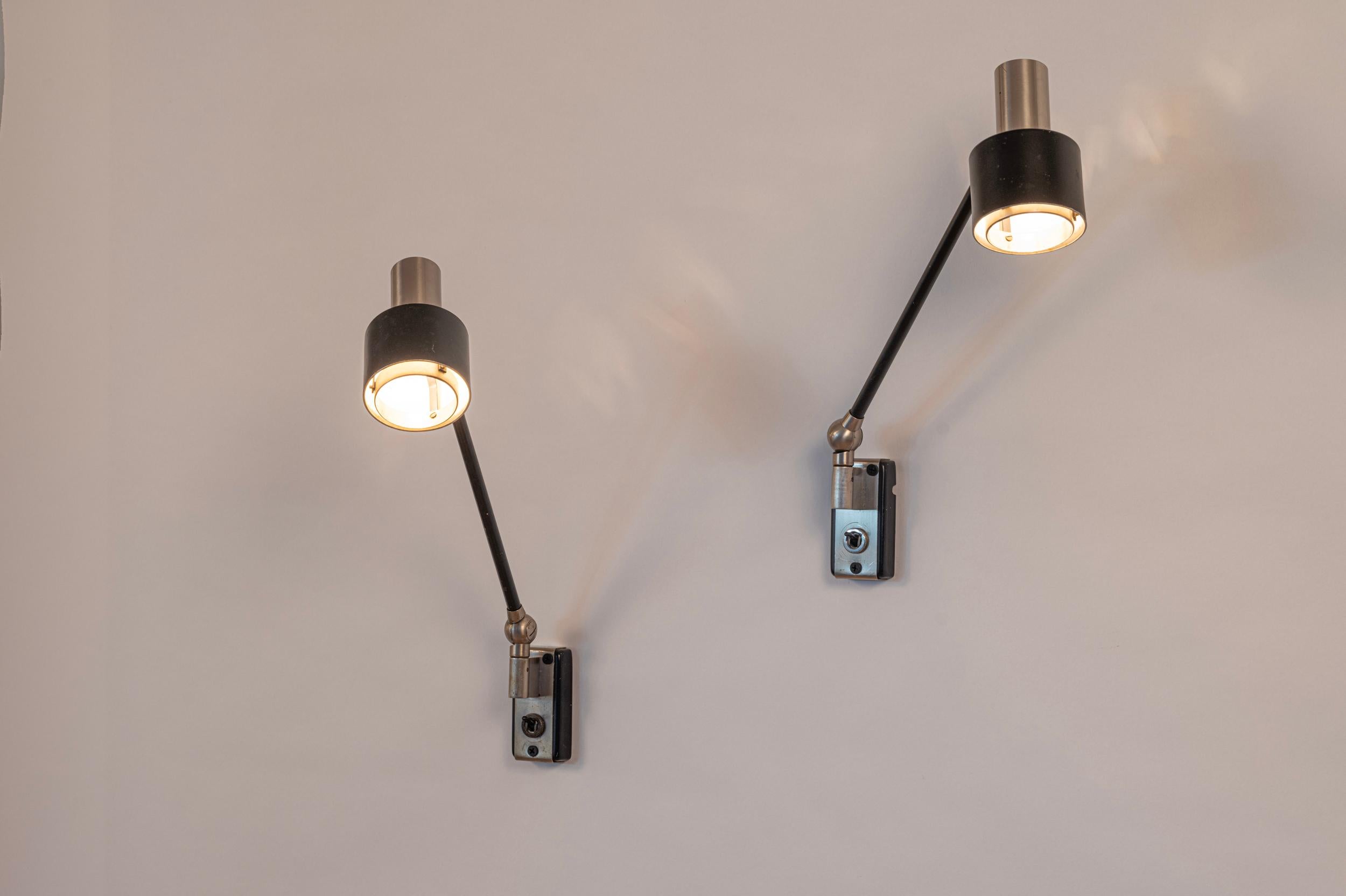 Mid-Century Modern Pair of articulated Stilnovo Wall lights. Italy c1950s For Sale