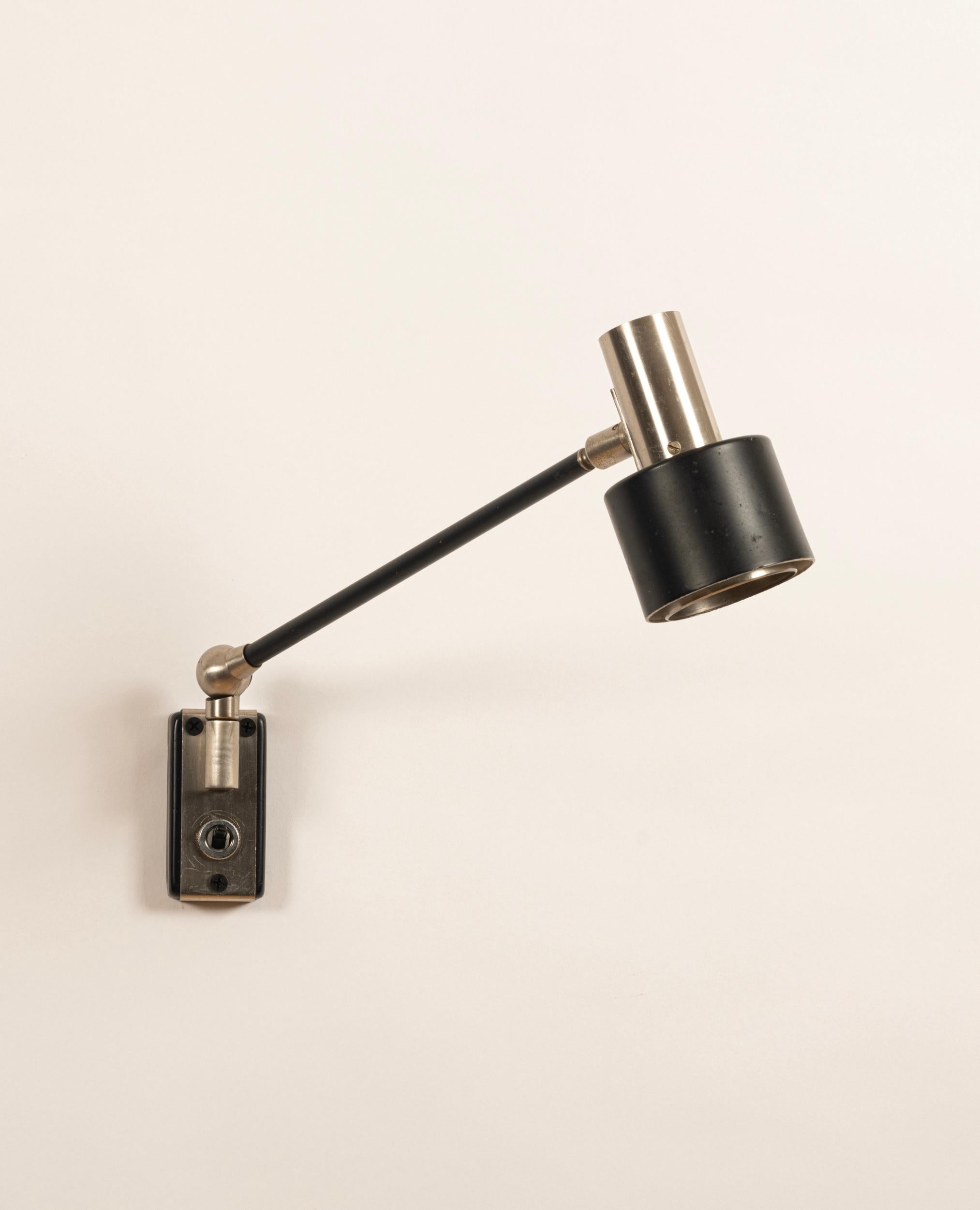 Metal Pair of articulated Stilnovo Wall lights. Italy c1950s For Sale