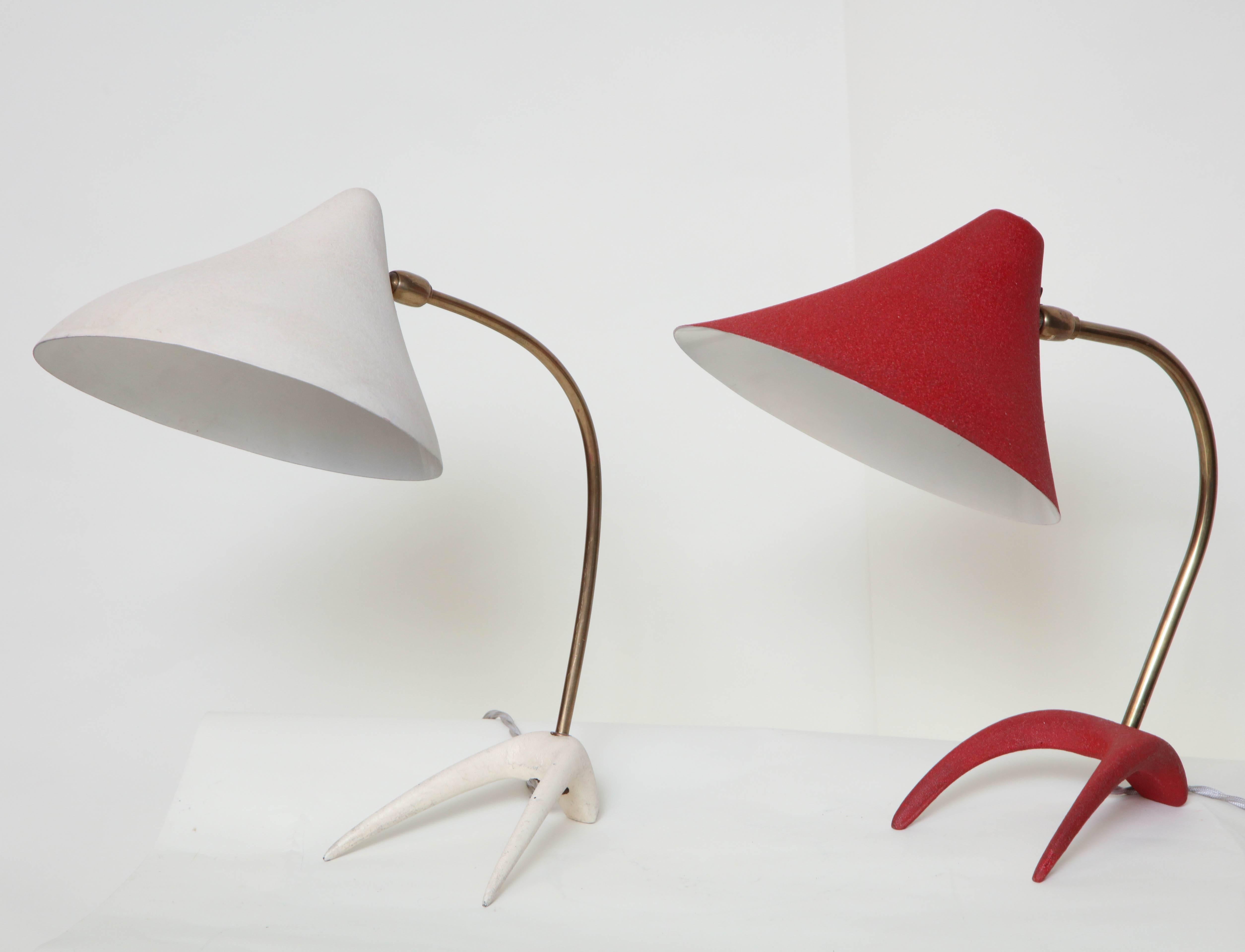 A pair of articulated table lamps 1950s Mid-Century Modern attributed to Kalmar.