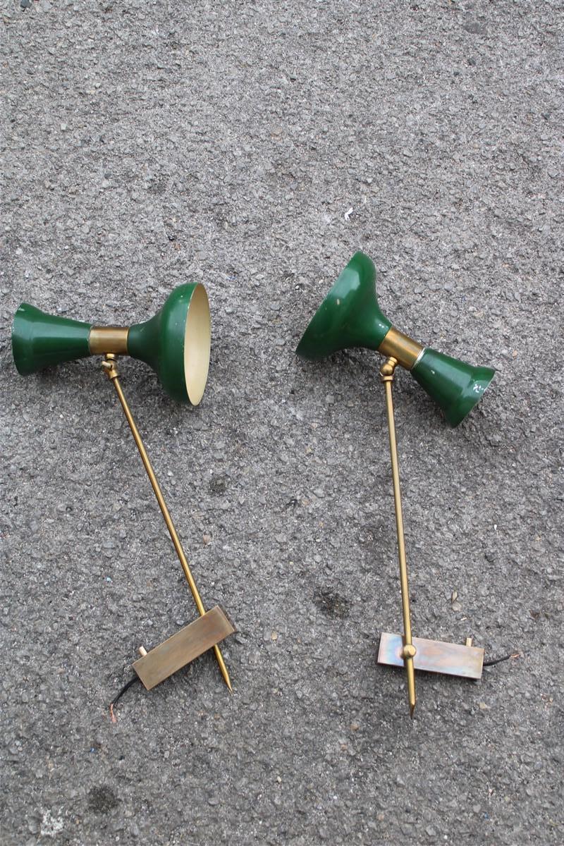 Pair of Articulated wall lamps in Mid-century Italian Green Brass Gold Stilnovo.