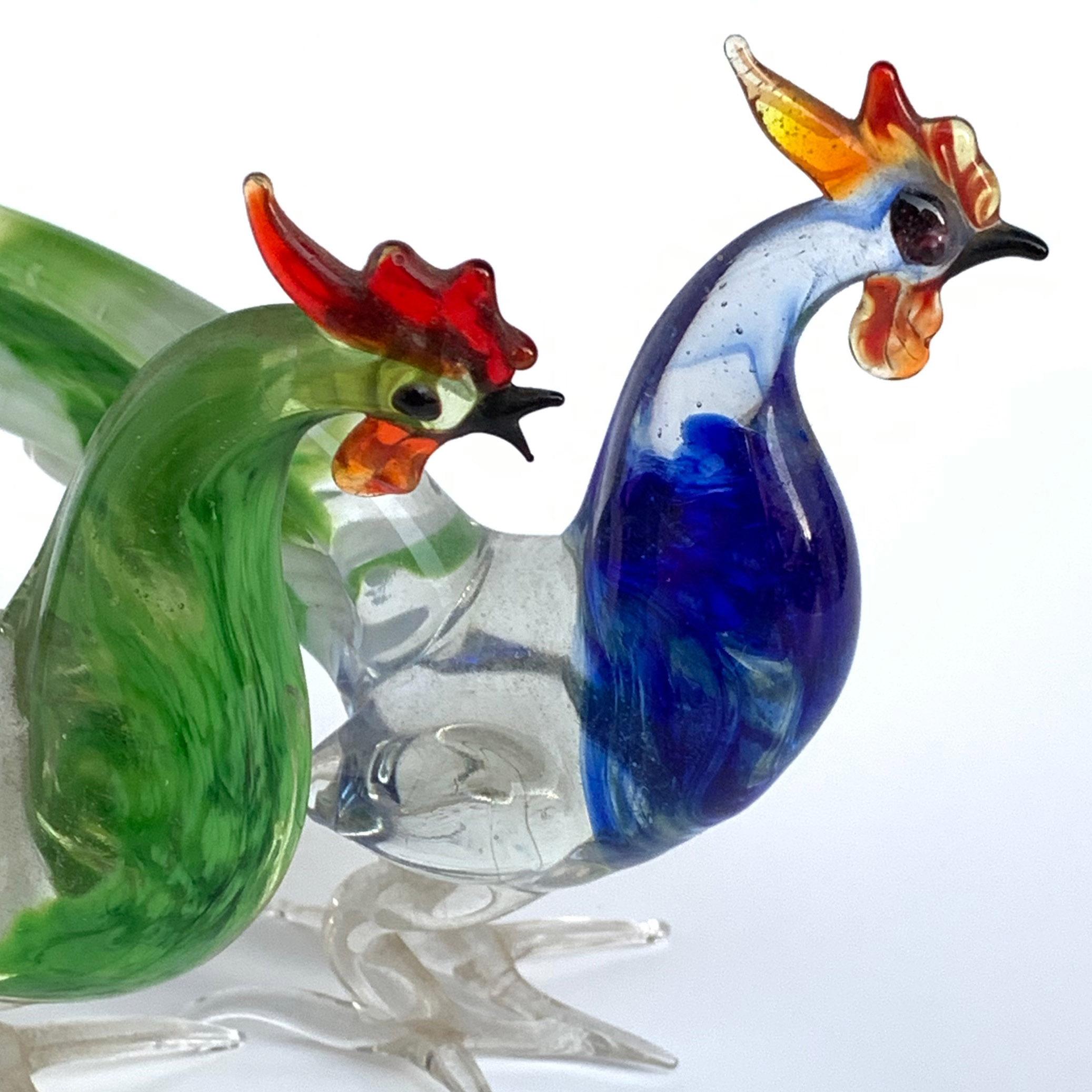 Murano glass sculptures depicting a pair of roosters. Multicolored artistic glass.
Made in Italy in the 1970s.