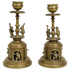 Pair of Arts and Crafts Brass Gnomes and Dwarves Embellished Candlesticks
