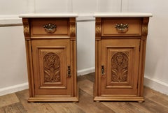 Pair of Arts and Crafts Carved Bedside Cupboards