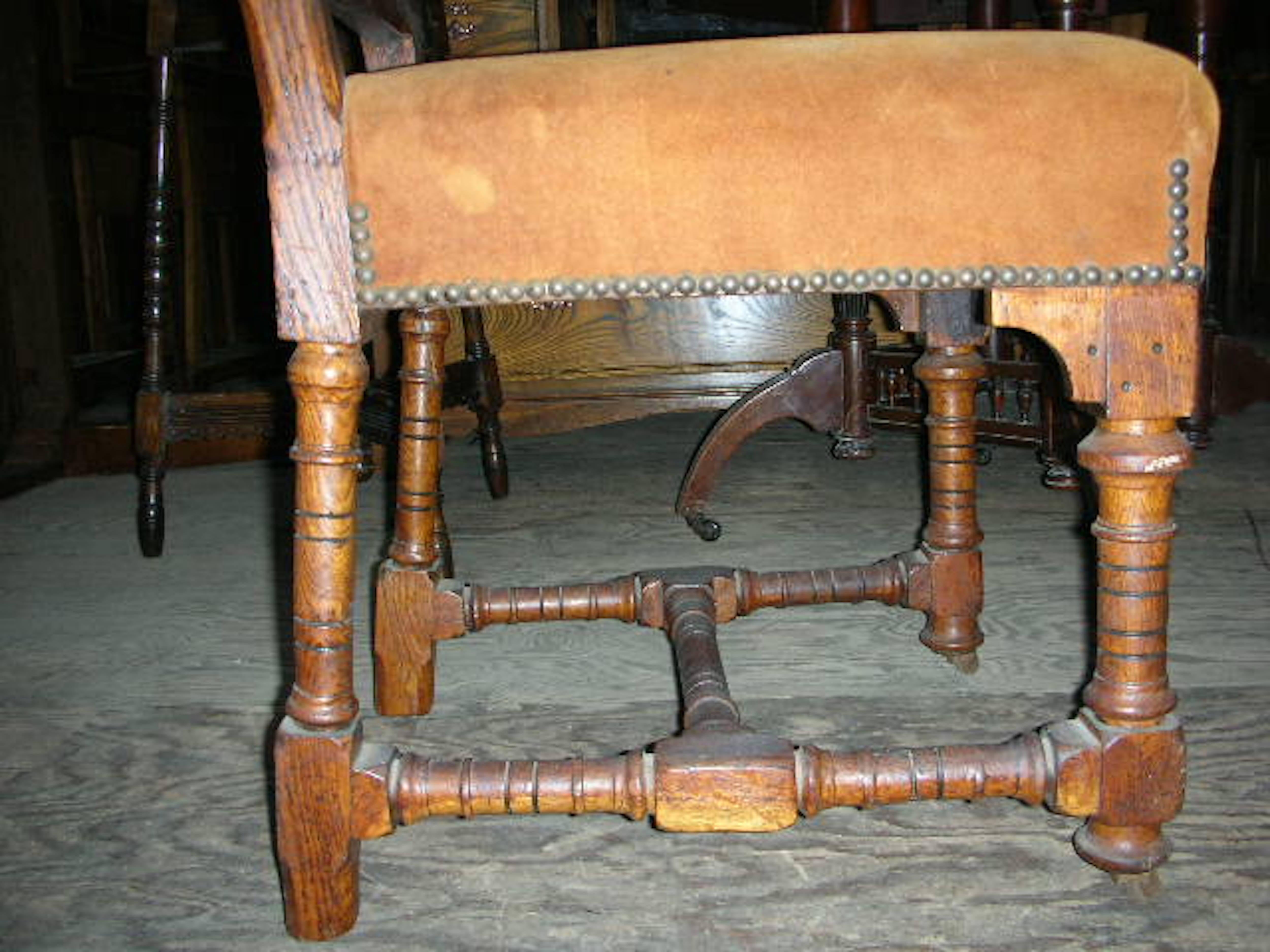 Oak John Pollard Seddon A pair of Gothic Revival oak dining chairs. 4 more available For Sale