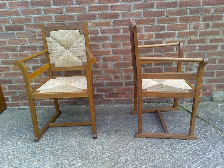 20th Century Pair of Arts and Crafts Oak Elbow Chairs, in the Manner of George Walton For Sale