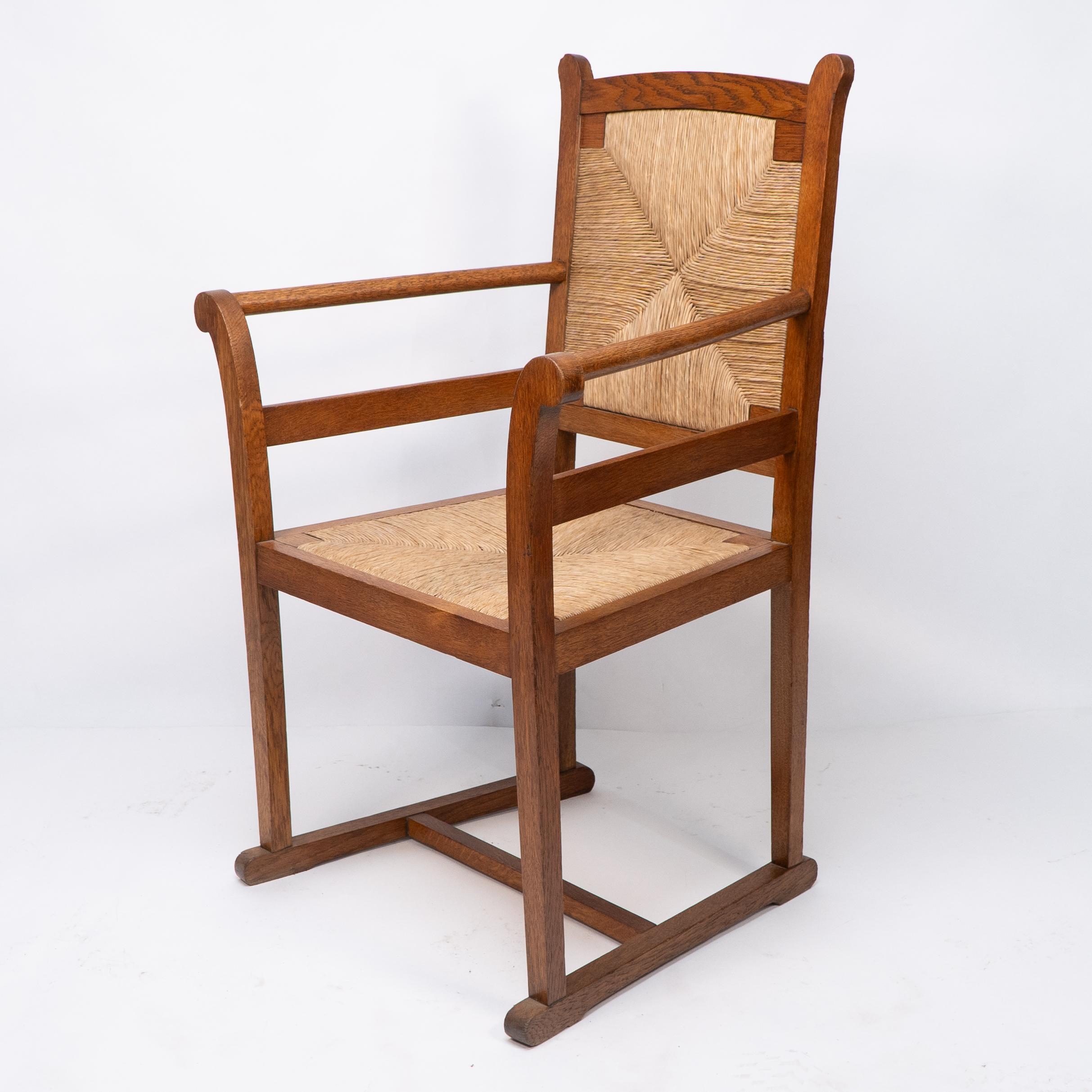 20th Century Pair of Arts and Crafts Oak Elbow Chairs, in the Manner of George Walton For Sale