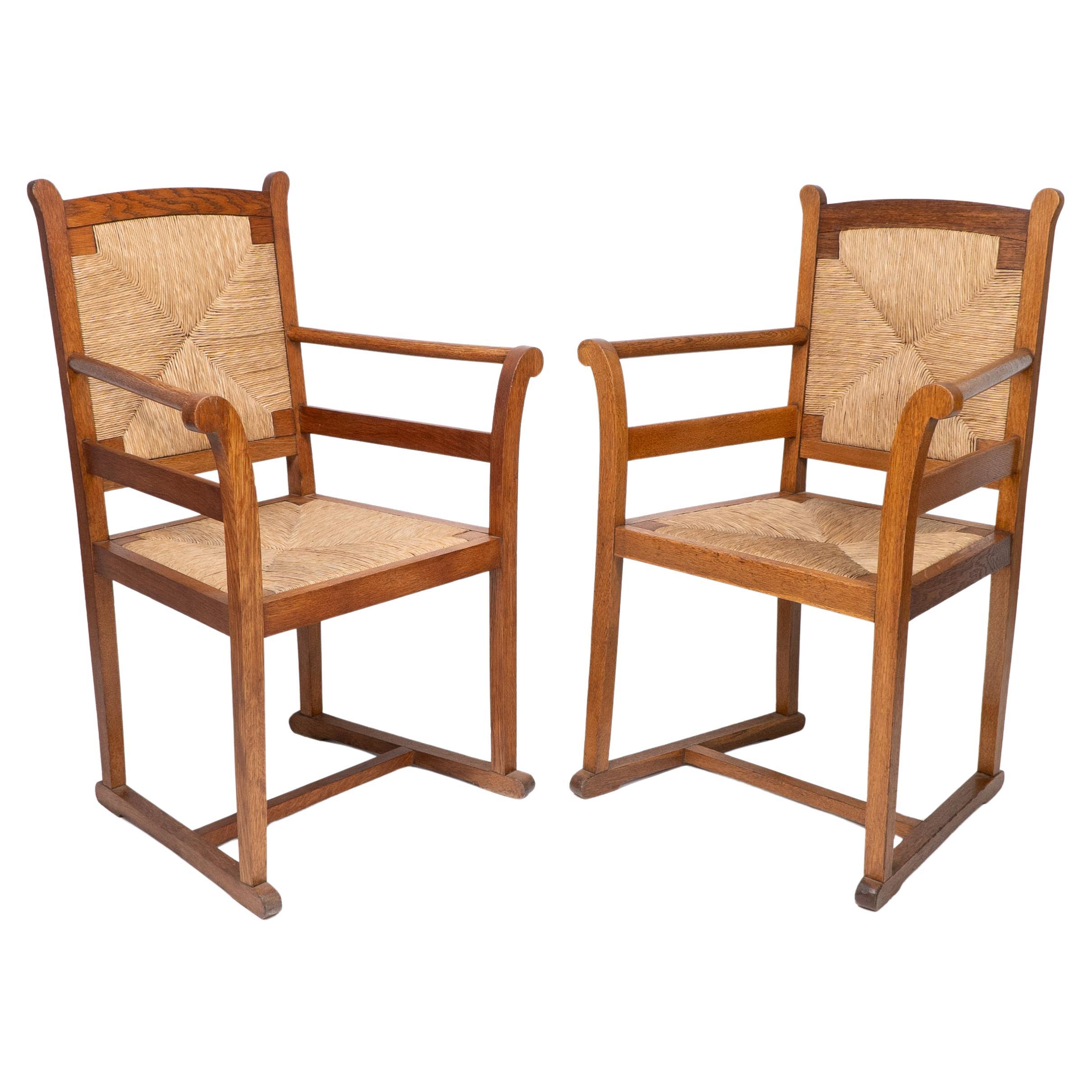 Pair of Arts and Crafts Oak Elbow Chairs, in the Manner of George Walton