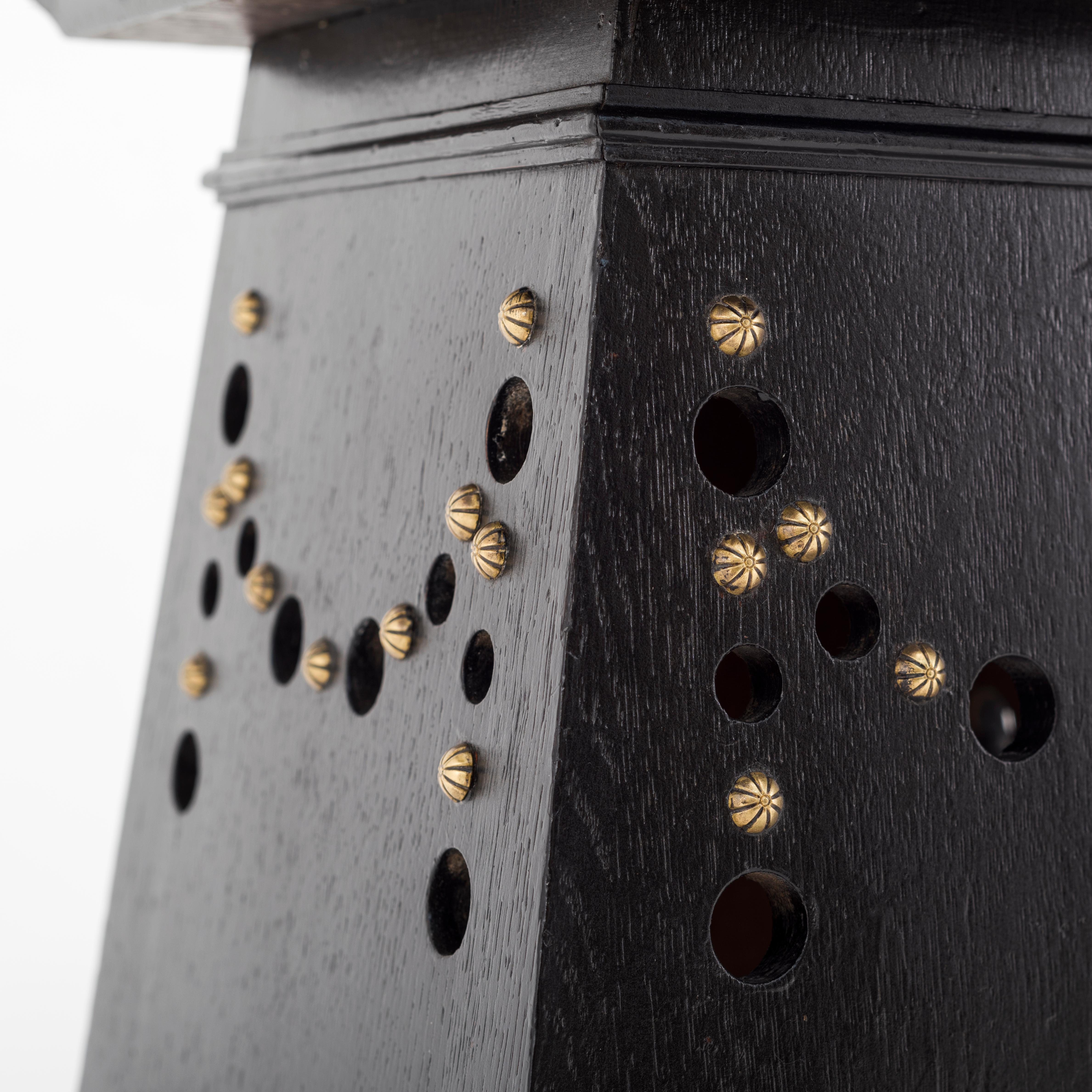 Pair of Arts & Crafts stools painted in black with studs in brass.