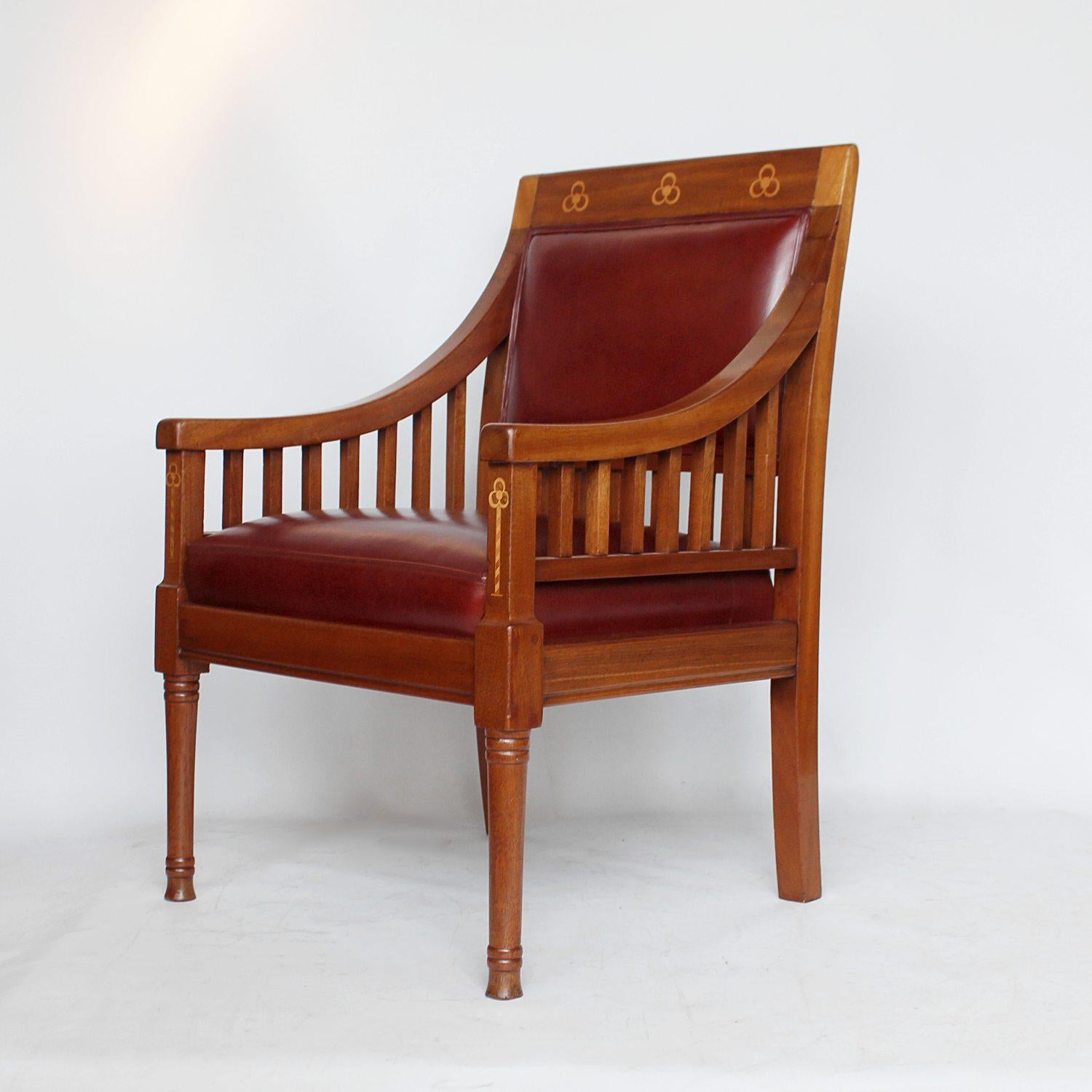 A pair of Arts & Crafts armchairs. Solid walnut frames, with satinwood inlay. Upholstered in chestnut leather.
Dimensions: H 90cm, W 56cm, D 60cm, seat H 45cm, seat D 48cm.

