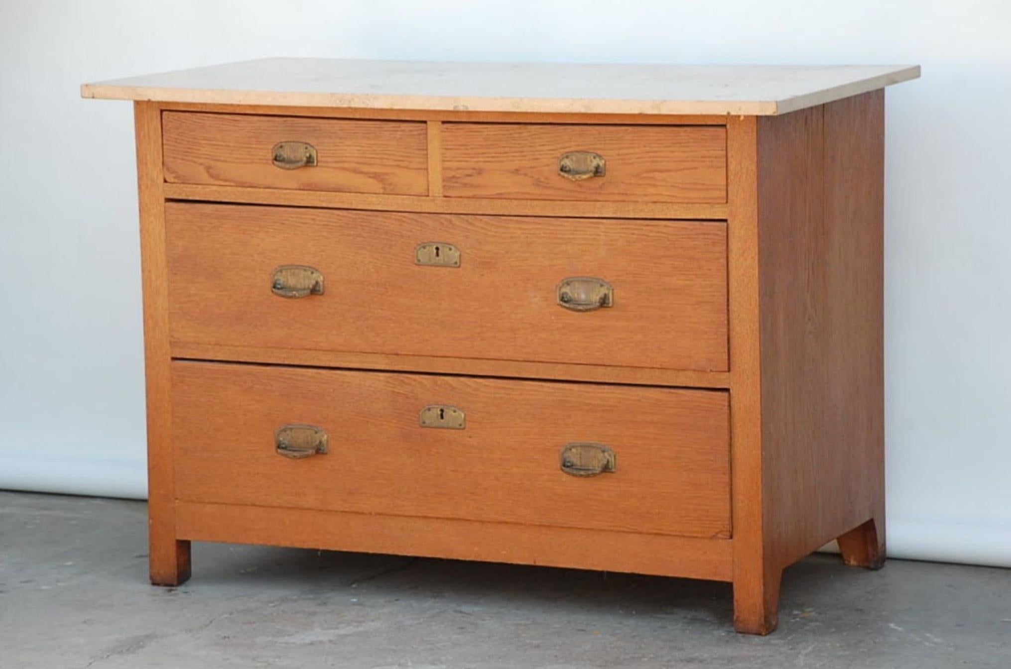 Hard to find pair of Arts & Crafts oak and travertine chest of drawers