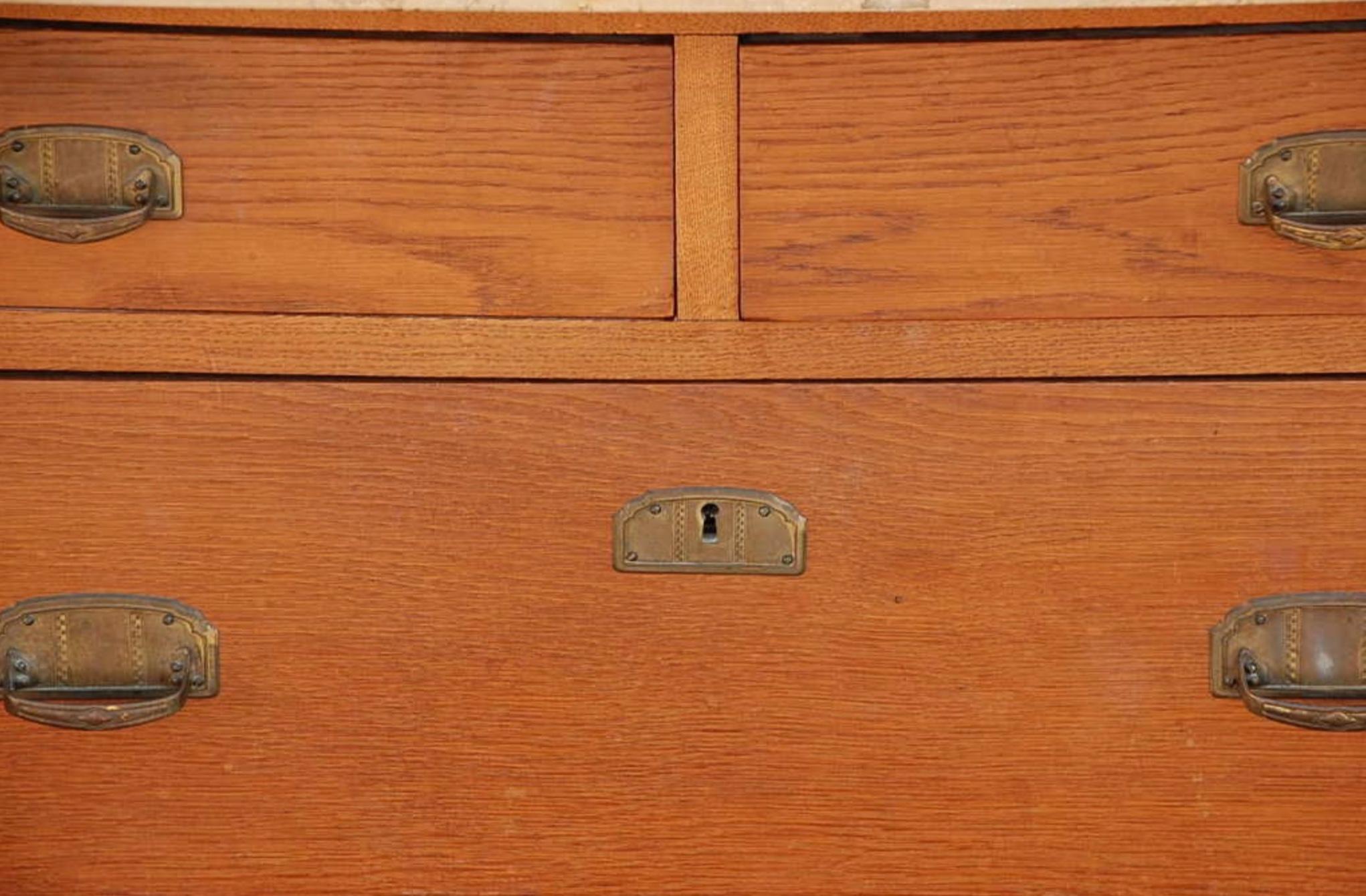 Brass Pair of Arts & Crafts oak and travertine chest of drawers For Sale