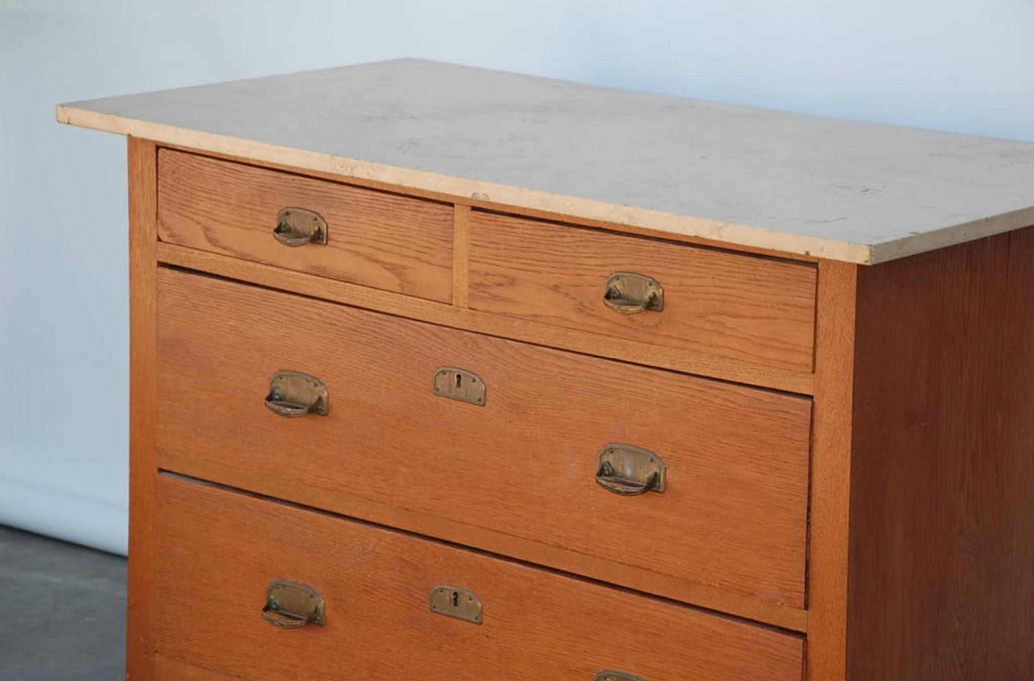 Pair of Arts & Crafts oak and travertine chest of drawers For Sale 2