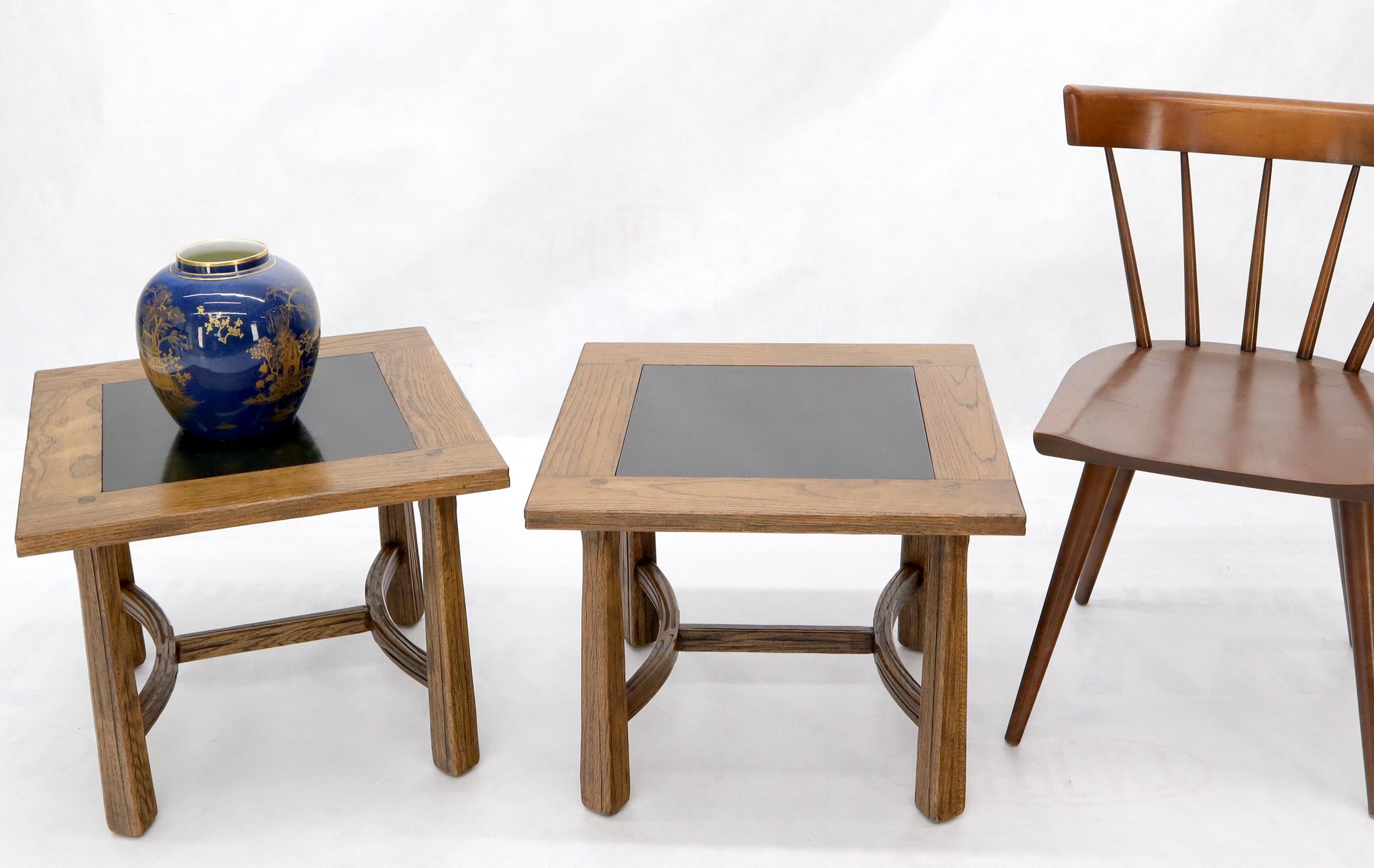 Pair of Mid-Century Modern Arts & Crafts era square oak side tables with slate tile top inserts.