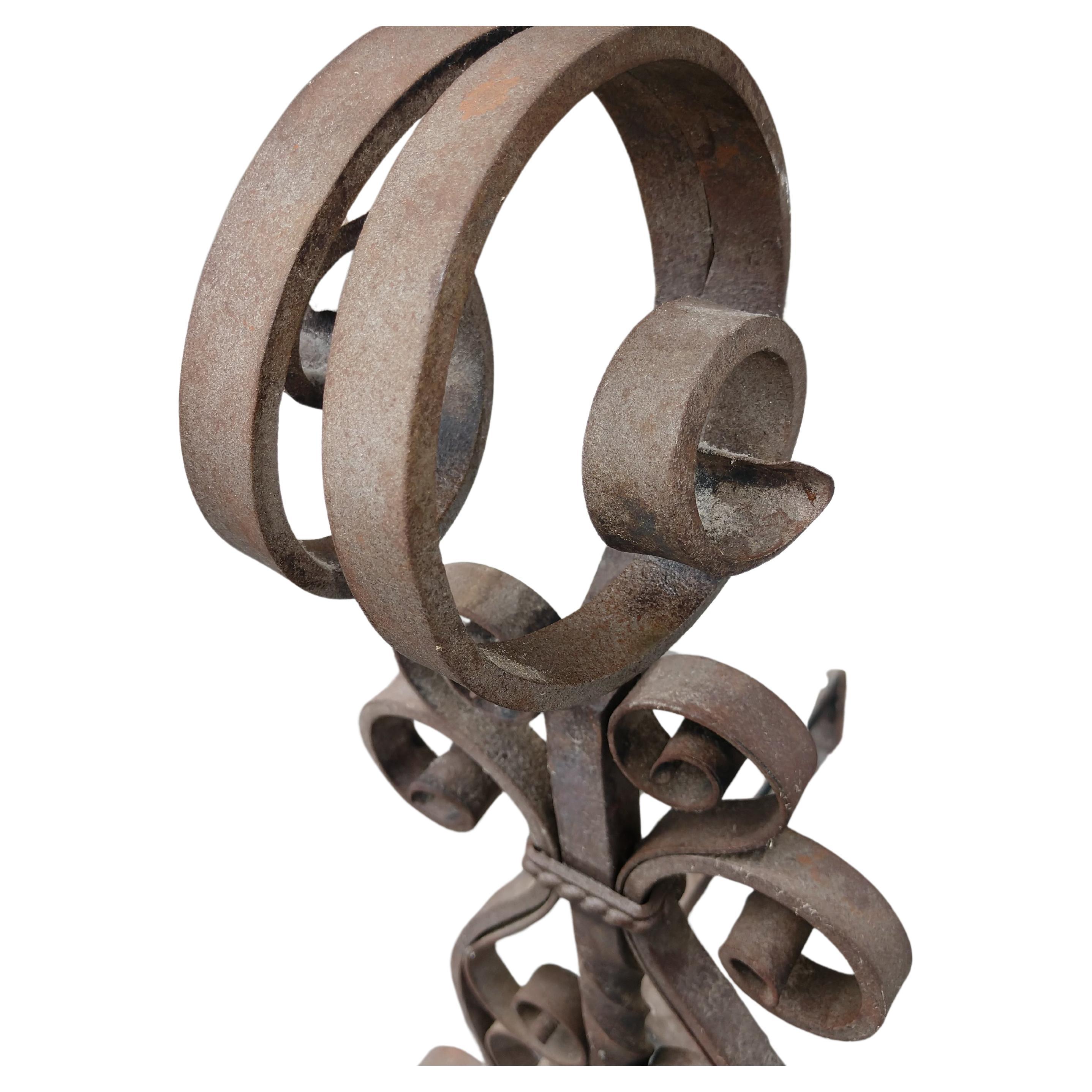 Fabulous pair of hand wrought iron forged andirons. Lots of meticulously crafted scroll work with size that make a statement. 30 inches tall by 14 inches wide by 21.75 deep each andiron.
