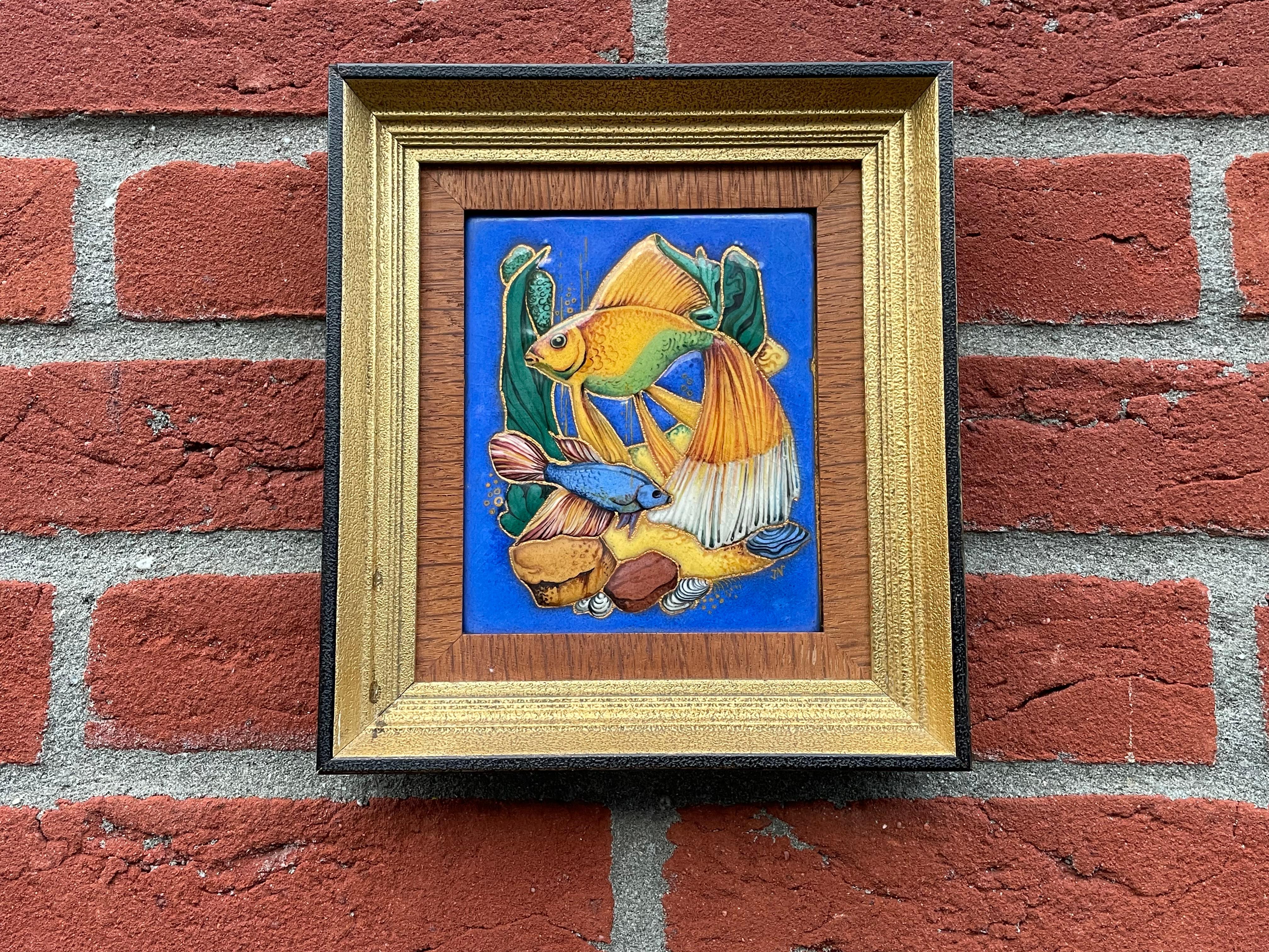 Amazing workmanship enamel paintings in original frames. 

This unique and stunning pair of Midcentury Modern enamel paintings, in our view, is fit for a fine art museum, because this is the type of refined artwork that you don't find aymore in this