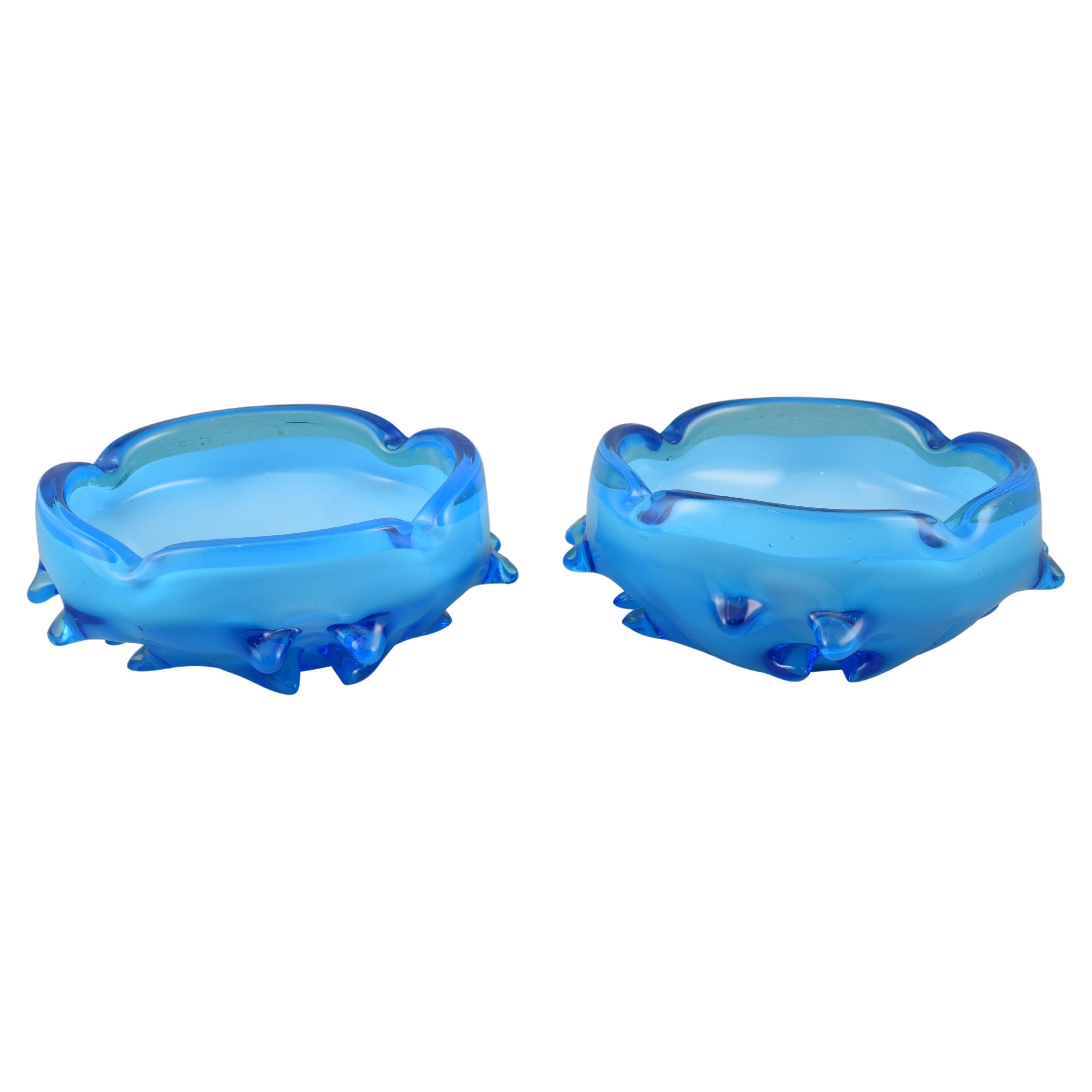 Pair of ashtrays. Blue glass. Murano, Italy, 20th century.