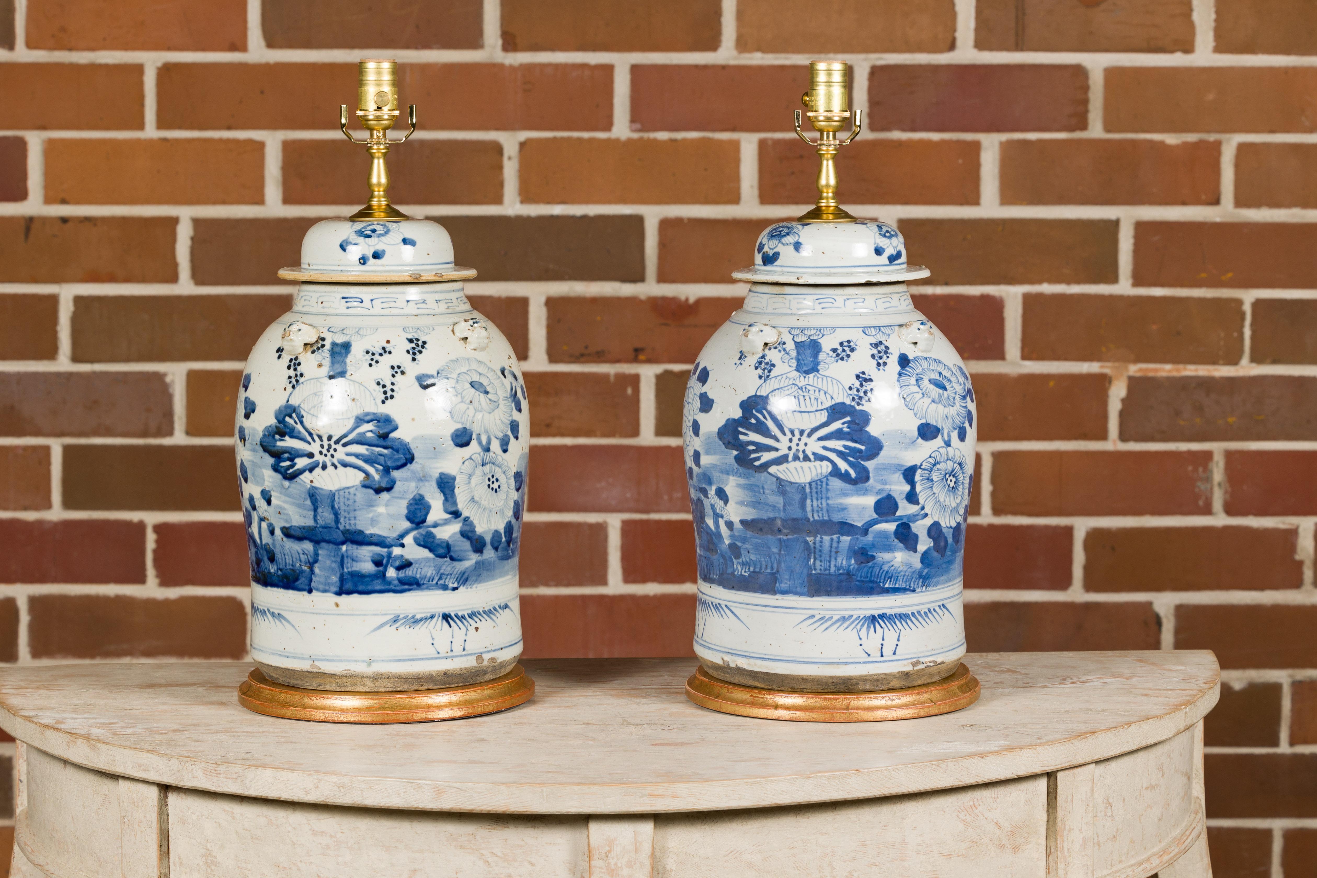 Gilt Pair of Asian Blue and White Porcelain Jars Made into Wired Table Lamps For Sale