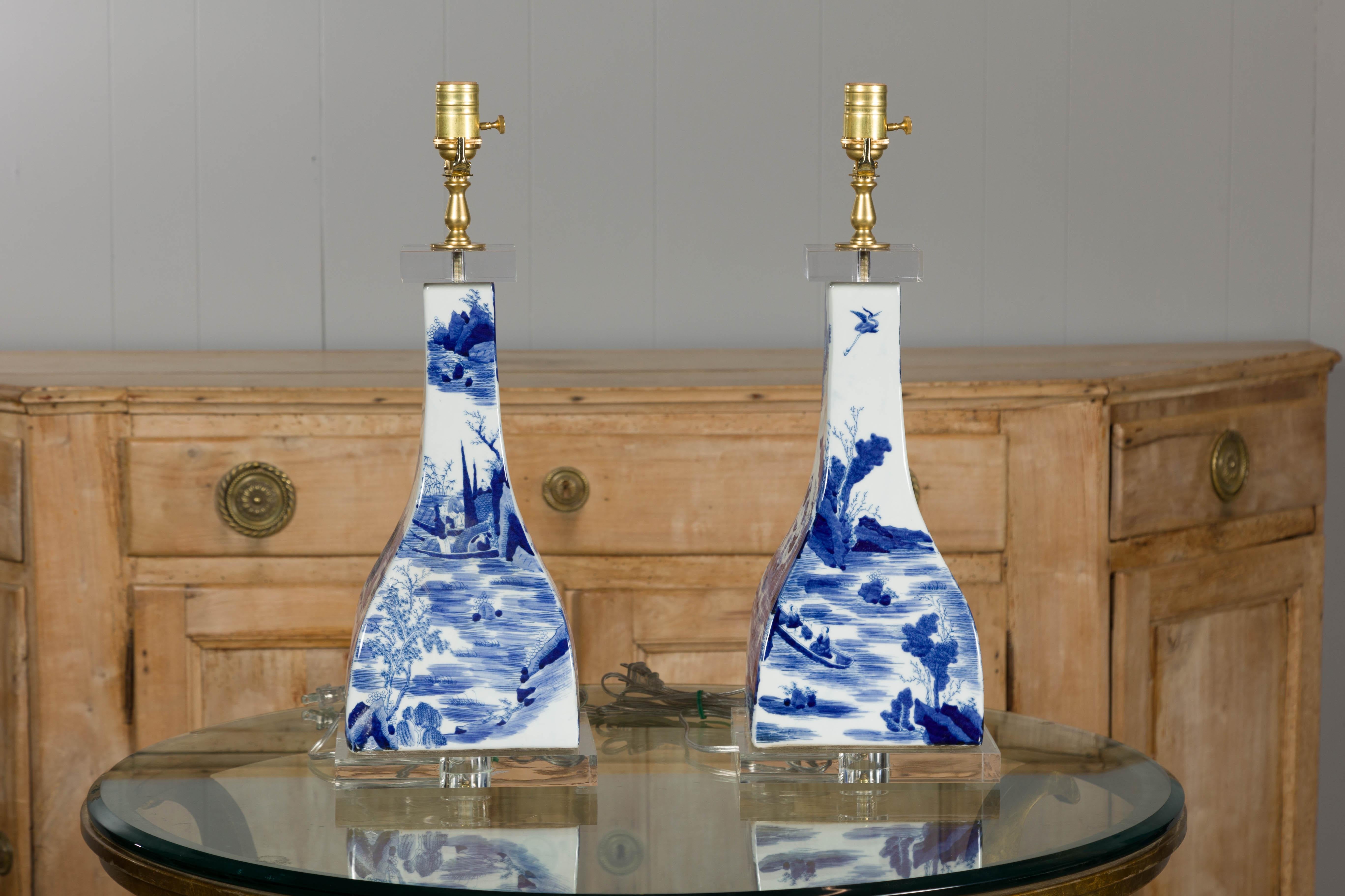 Painted Pair of Asian Blue and White Porcelain Table Lamps Mounted on Custom Lucite For Sale