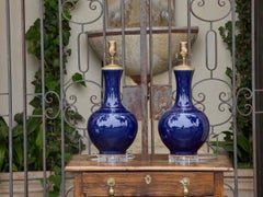 Pair of Asian Blue Glazed Porcelain Bottle Form Lamps on Lucite Bases