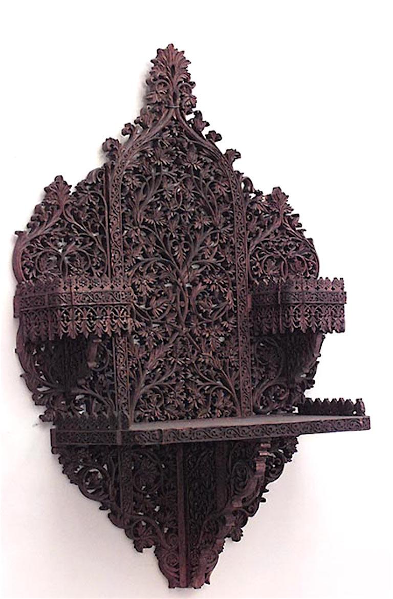 Pair of Asian Burmese style carved teak wall shelves with filigree design and 2 side shelves, 19th century.