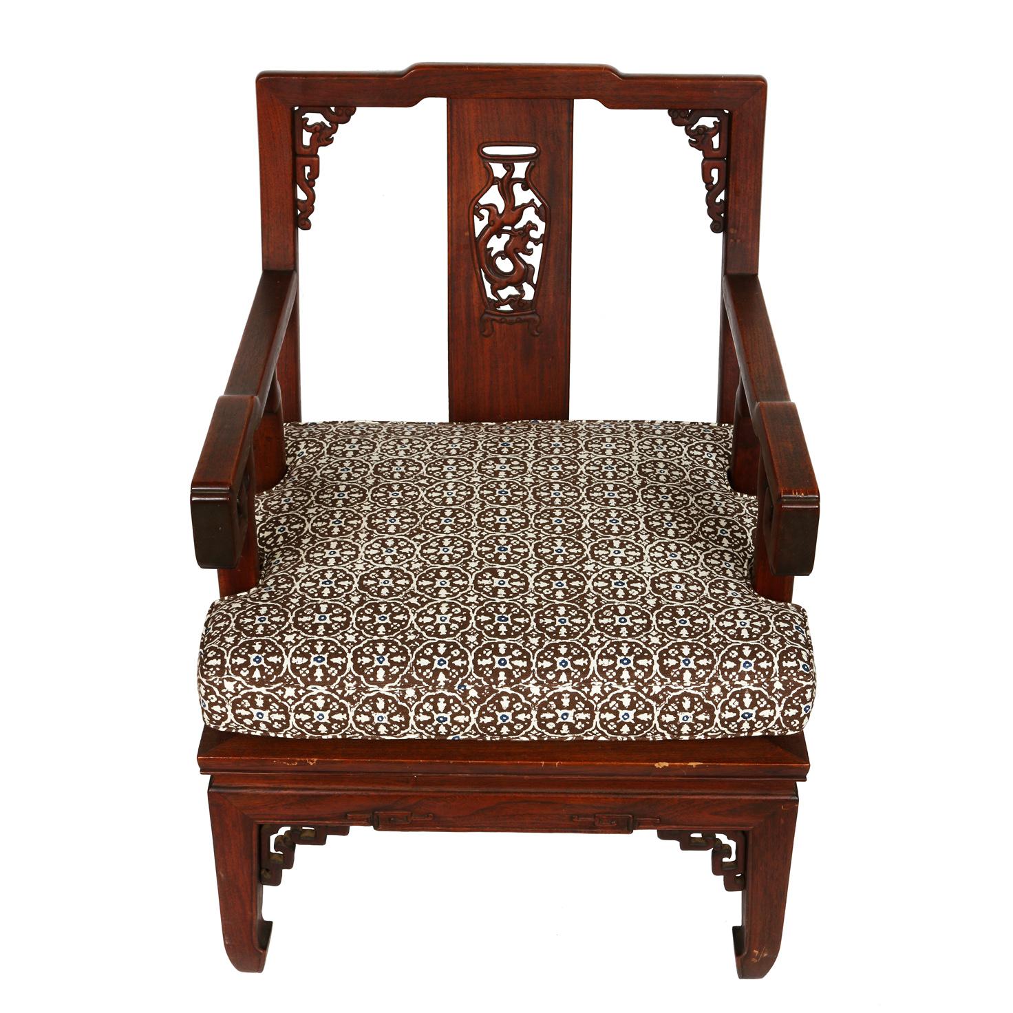 A pair of Asian carved hardwood chairs in square shape with newly upholstered tailored cushions.