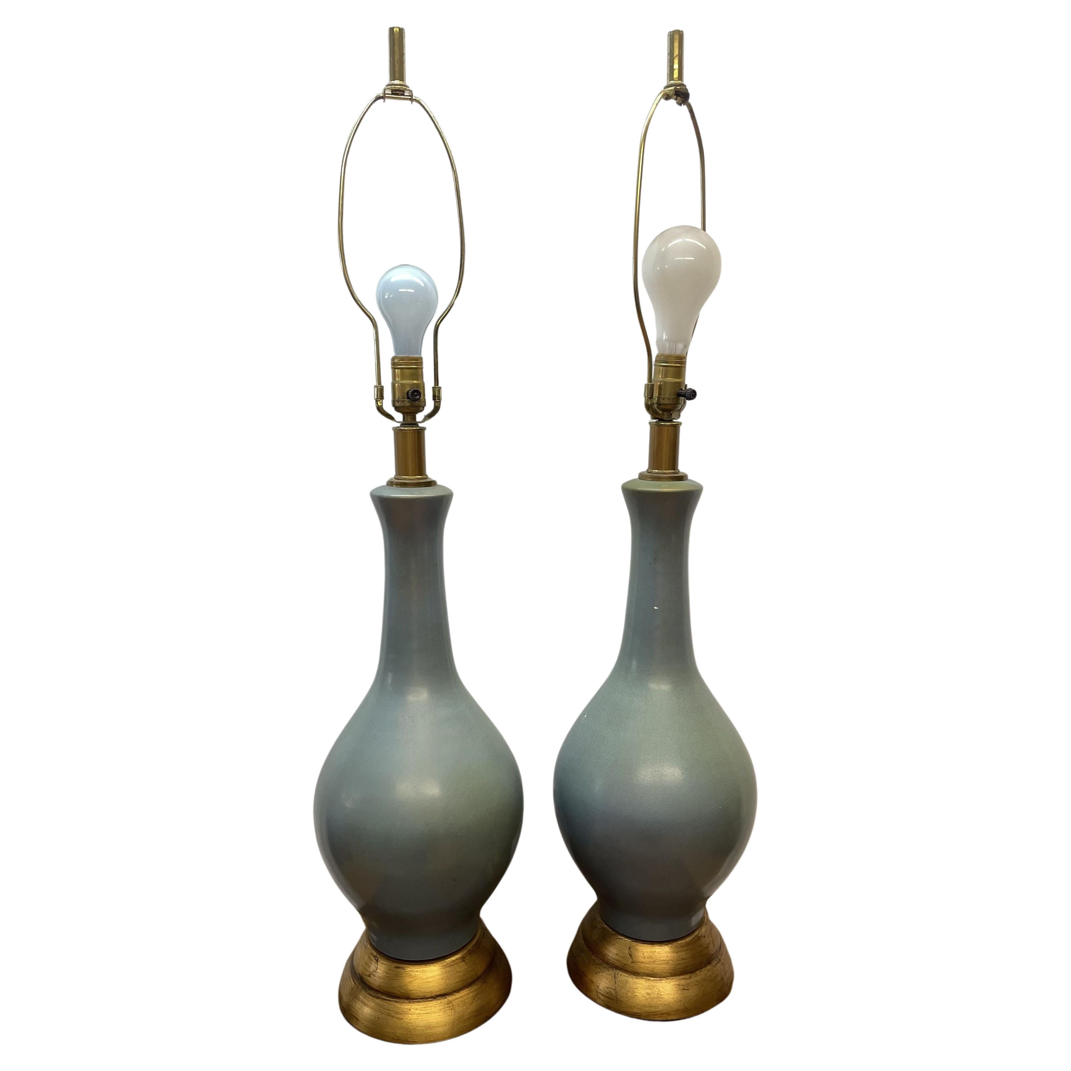 Pair of Asian celadon cradle glazed vases mounted as lamps For Sale