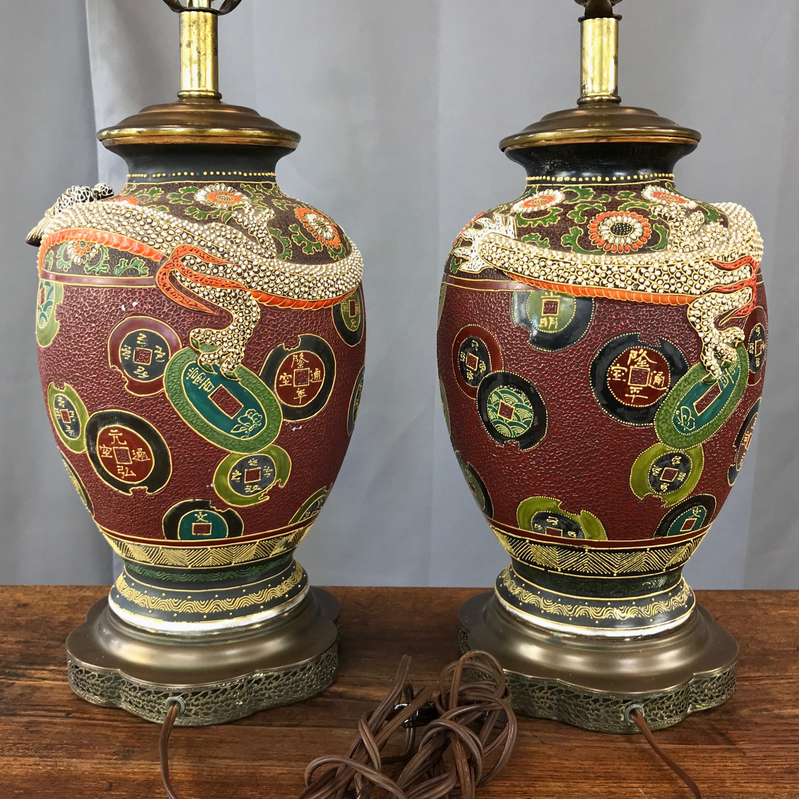Chinoiserie Pair of Asian Dragon and Charm Motif Hand-Decorated Ceramic Table Lamps