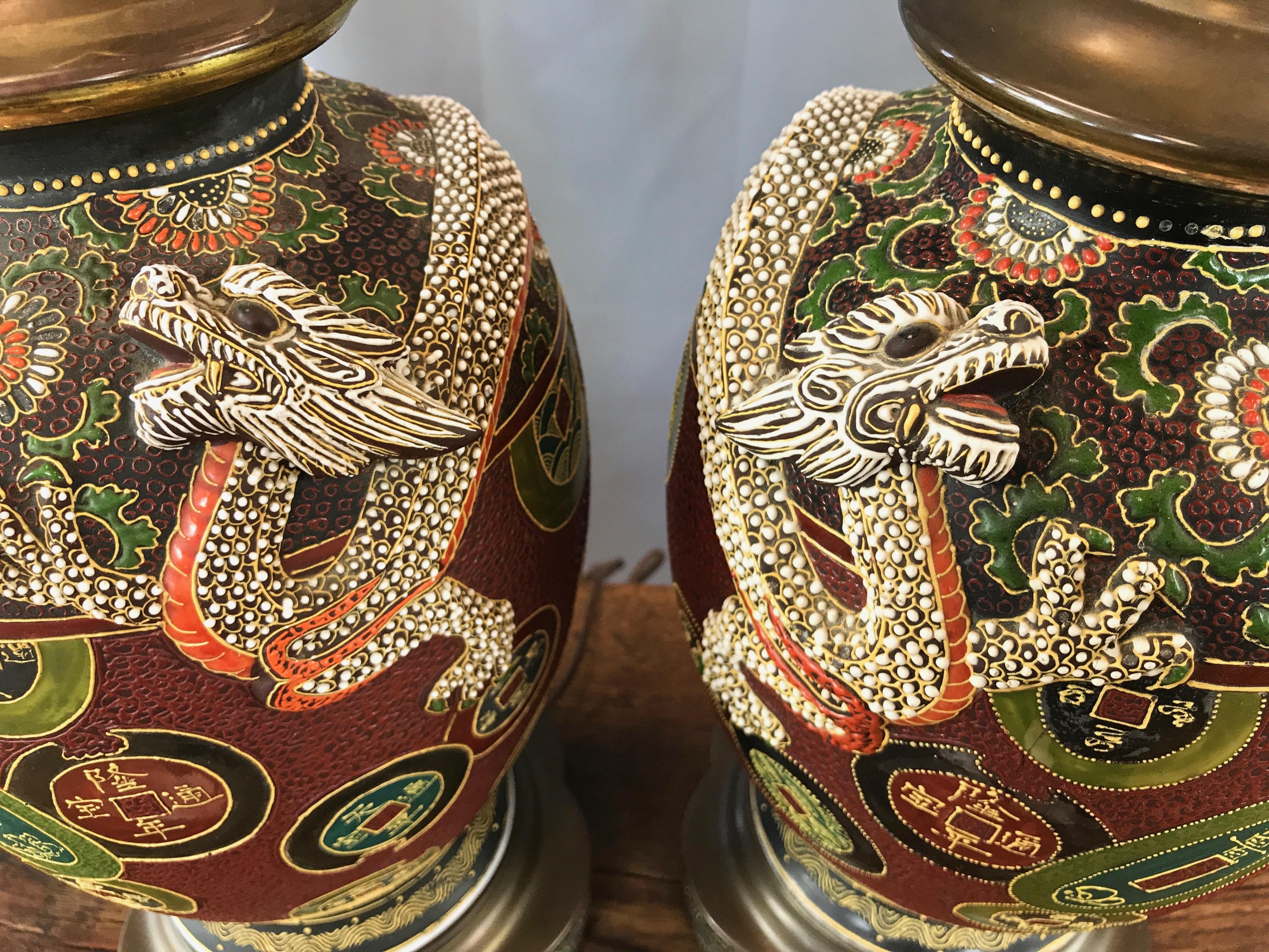 Pair of Asian Dragon and Charm Motif Hand-Decorated Ceramic Table Lamps In Good Condition In San Francisco, CA