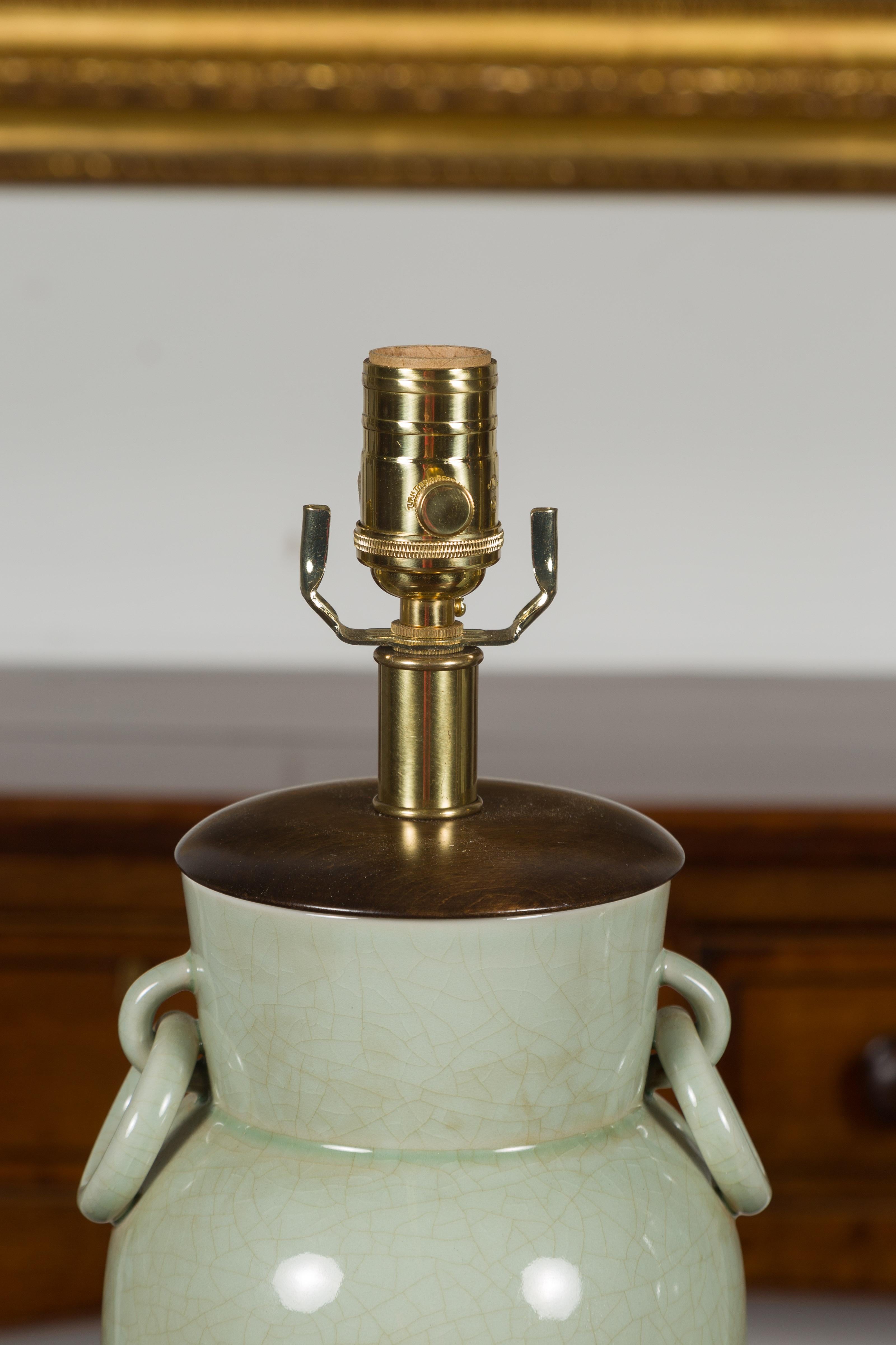 20th Century Pair of Asian Midcentury Celadon Table Lamps Made of Urns Mounted on Lucite