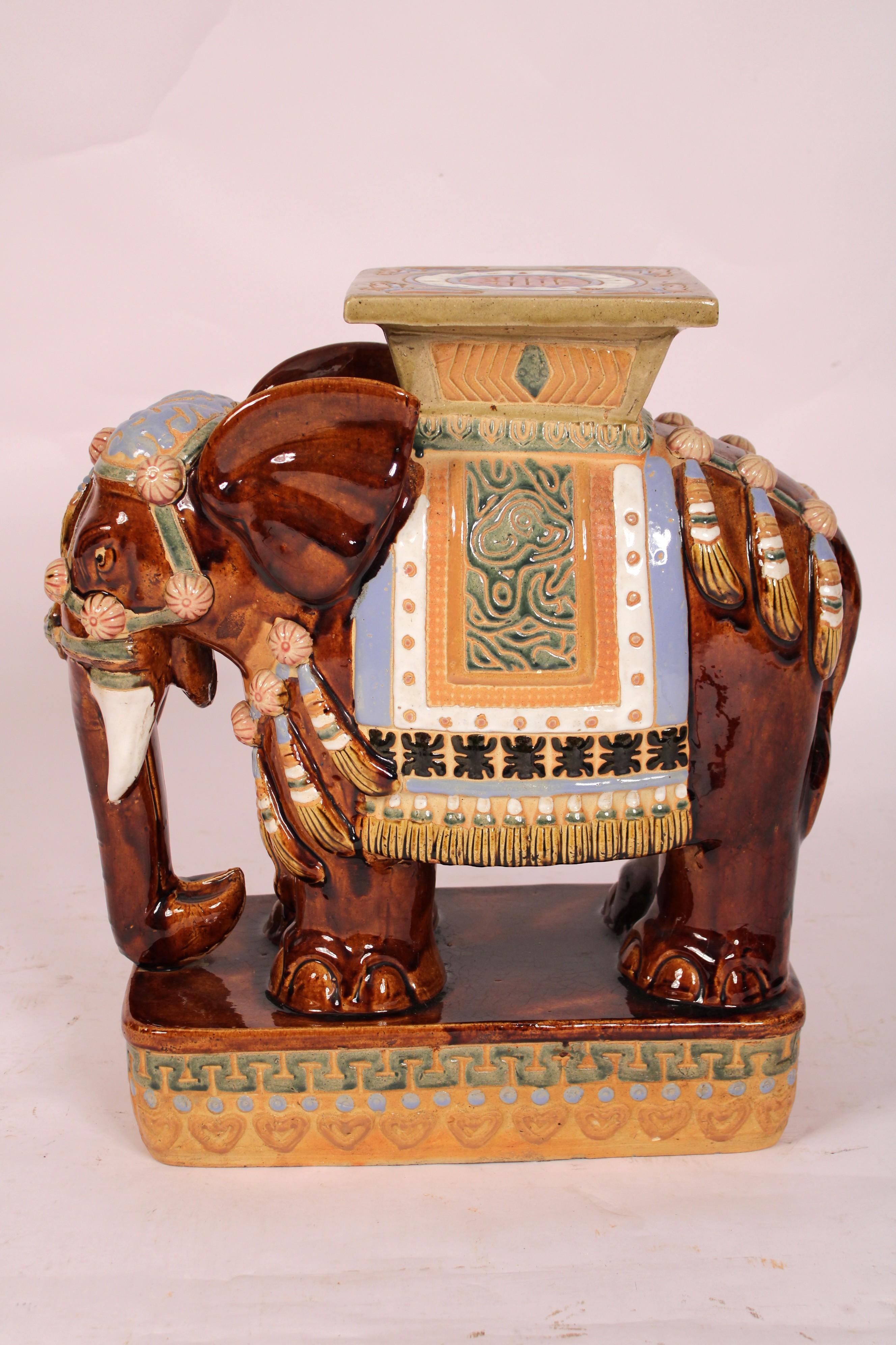 Pair of colorful Asian Polychrome decorated stoneware elephant form garden seats, circa late 20th century. 