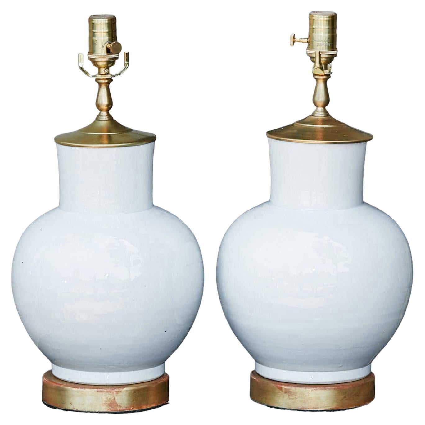 Pair of Asian Porcelain Single Light Table Lamps with Round Gilt Bases For Sale