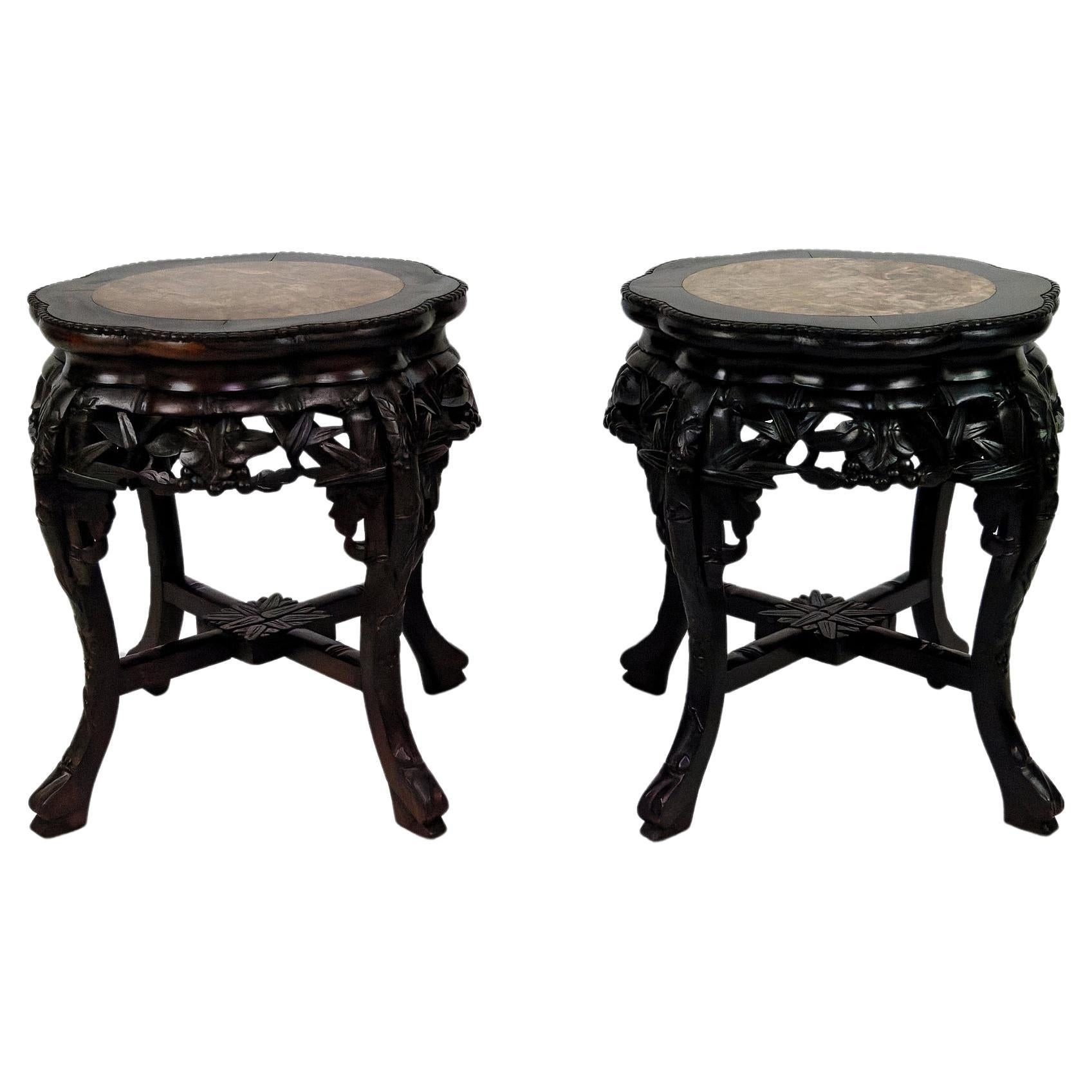 Pair of Asian side tables / coffee tables in carved wood and marble tops, 1880's