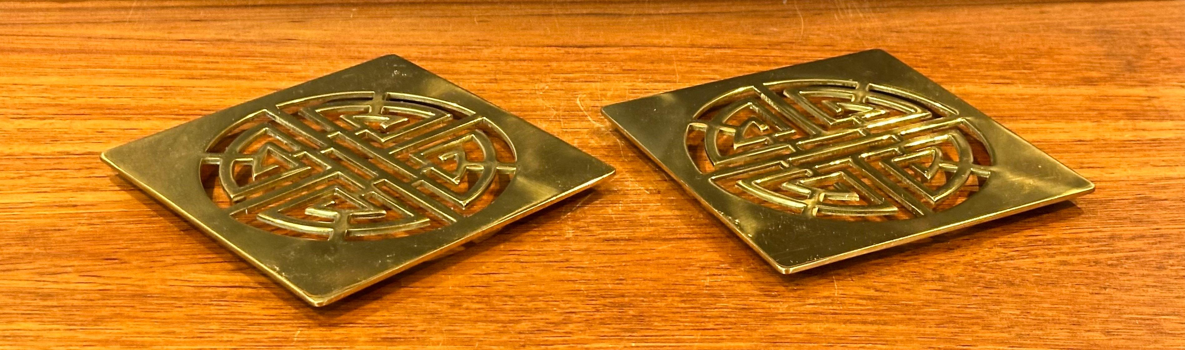 20th Century Pair of Asian Style Brass Trivets by Gumps For Sale