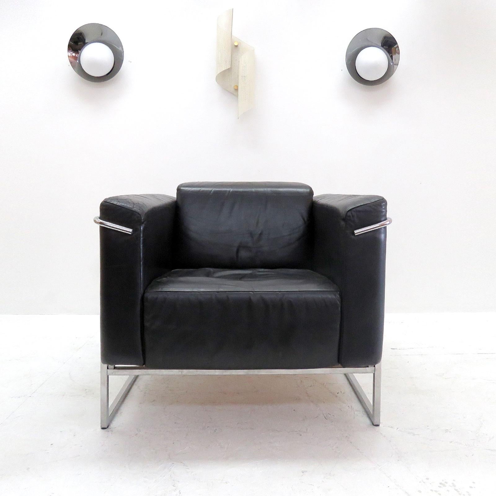 Stunning pair of 'Classio, model 8283' chrome and black leather chairs by Asko, Finland, designed in 1982, cubic design similar to Le Corbusier's LC2 lounge chairs, marked.