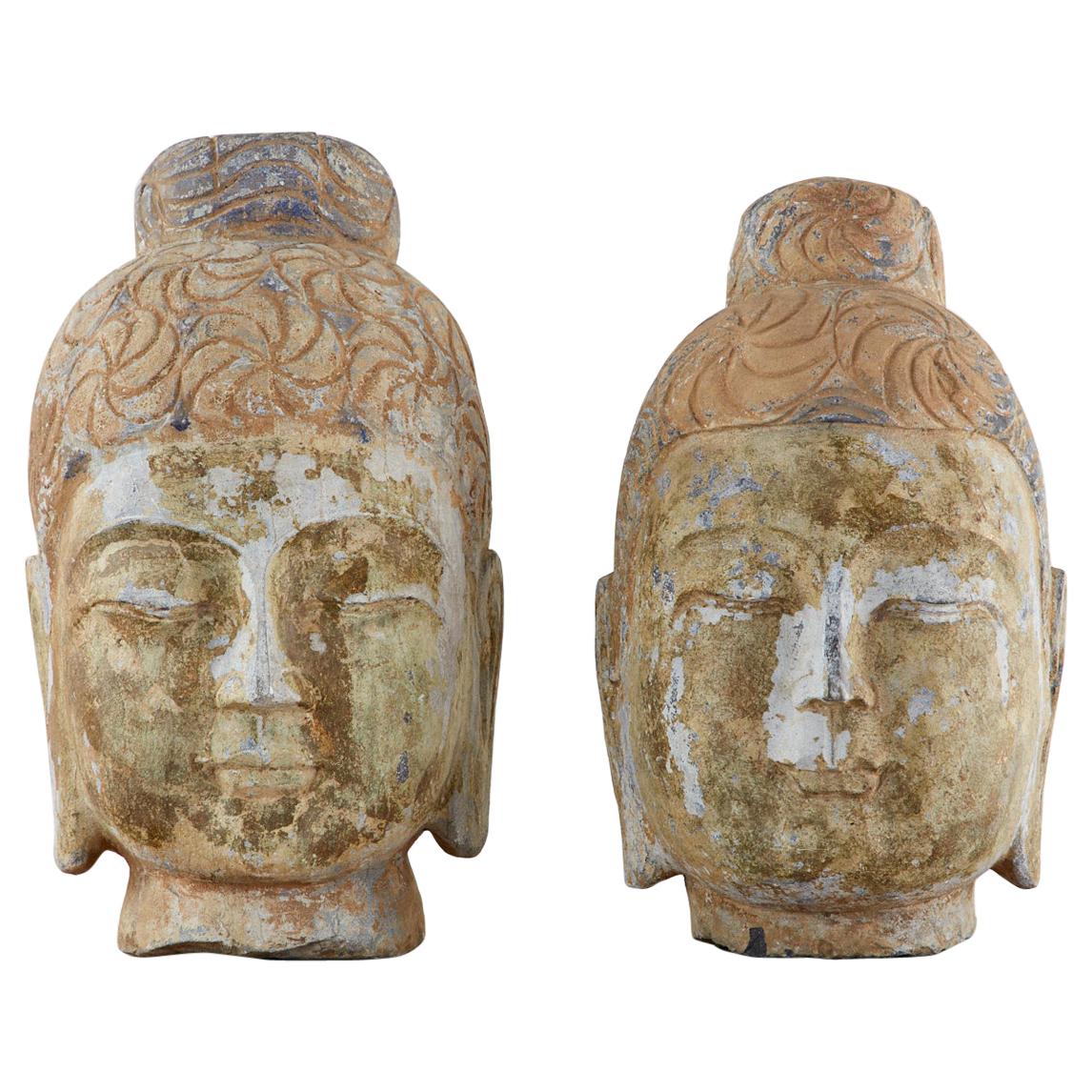 Pair of Associated Chinese Style Carved Stone Buddha Head Busts