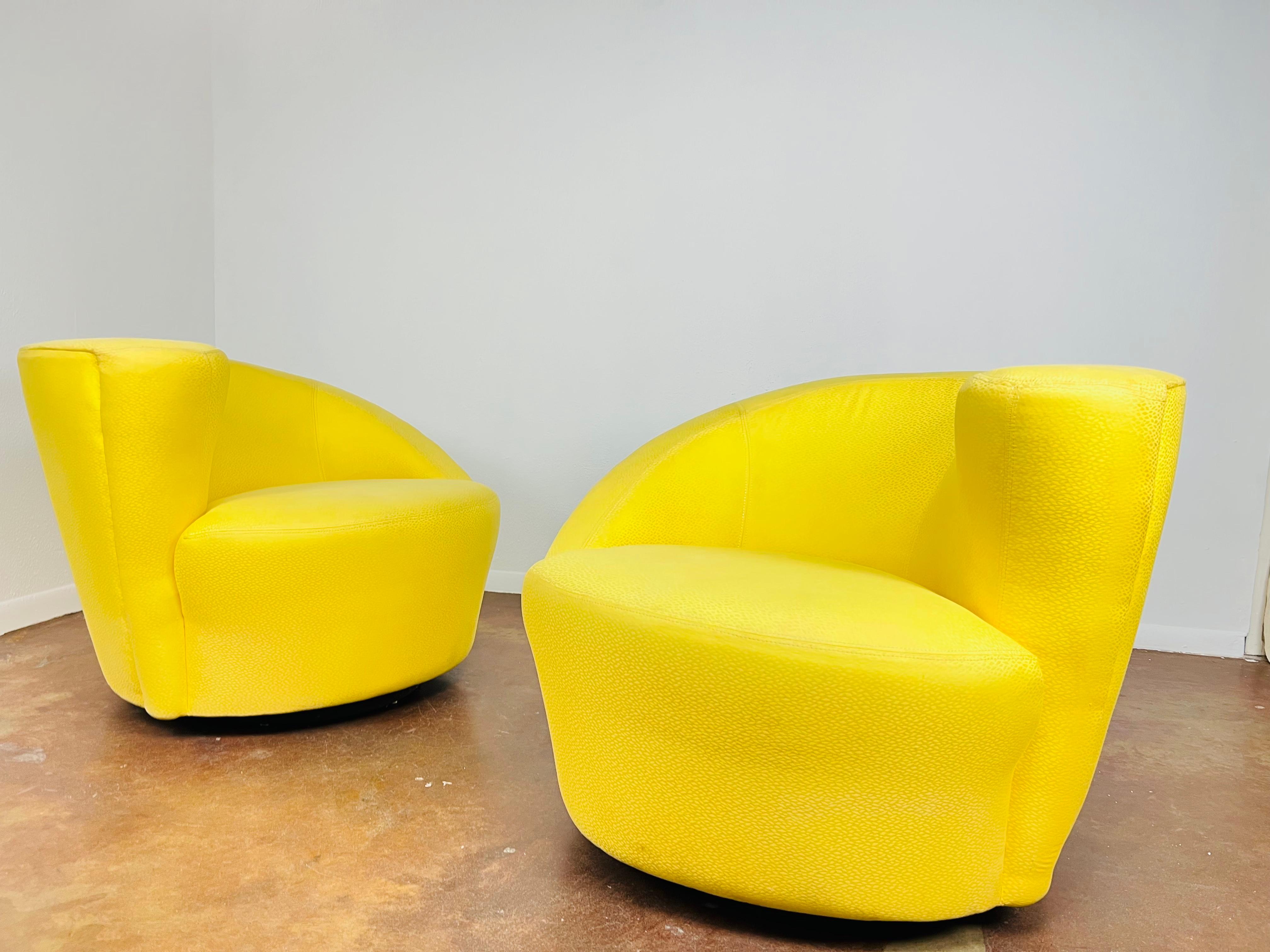 Late 20th Century Pair of Asymmetrical Nautilus Swivel Chairs 
