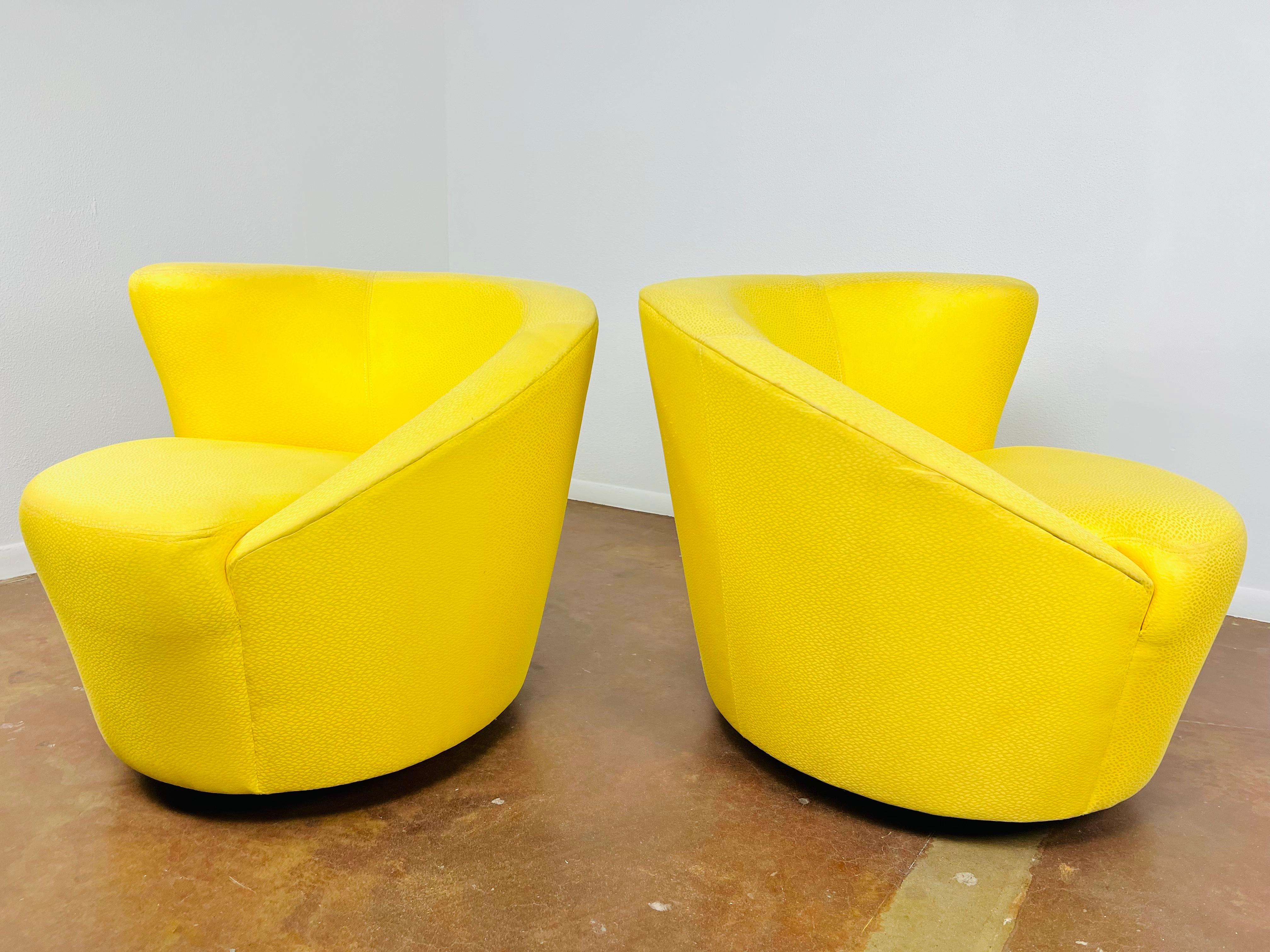 Upholstery Pair of Asymmetrical Nautilus Swivel Chairs 