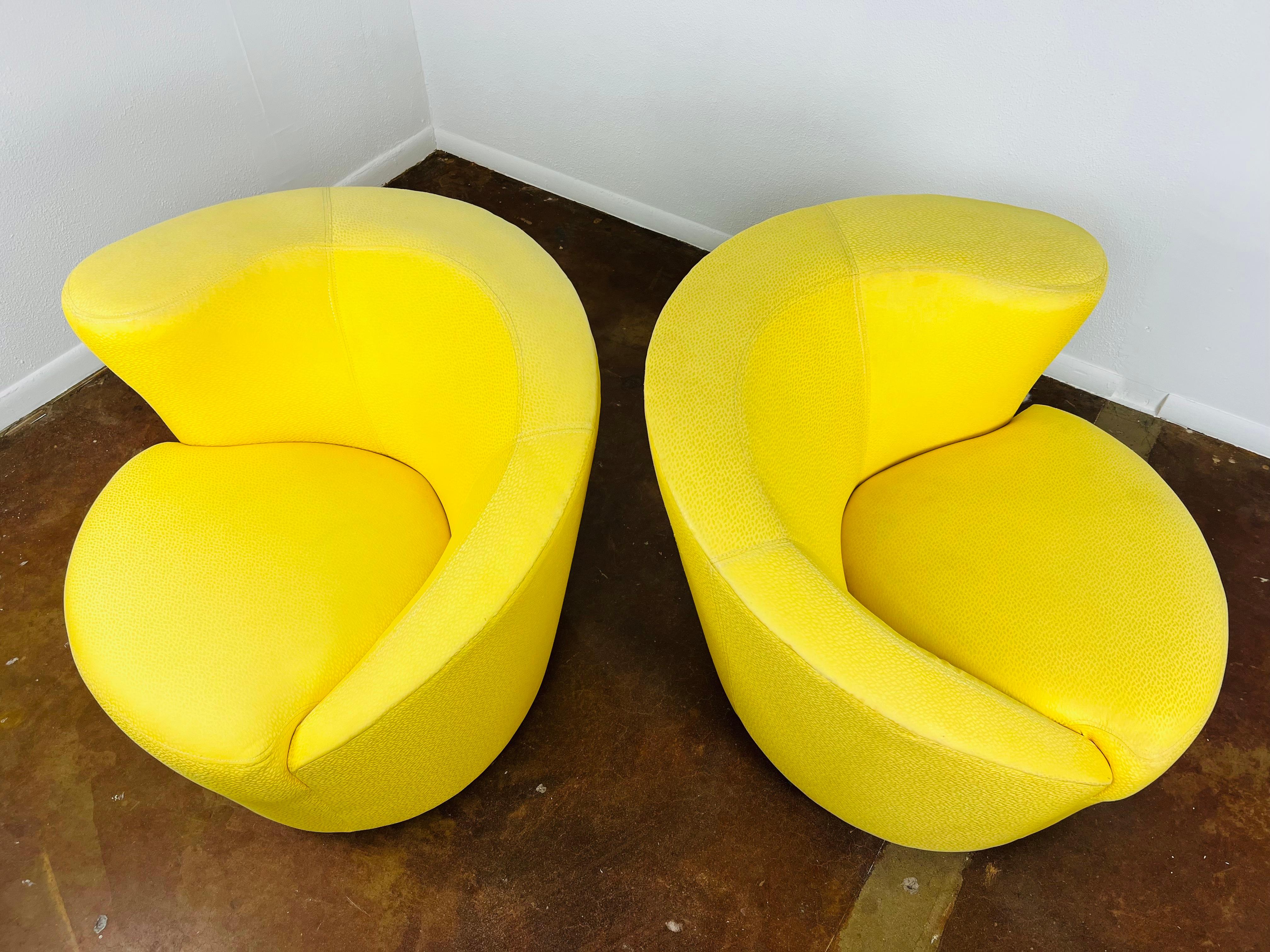 Pair of Asymmetrical Nautilus Swivel Chairs  1