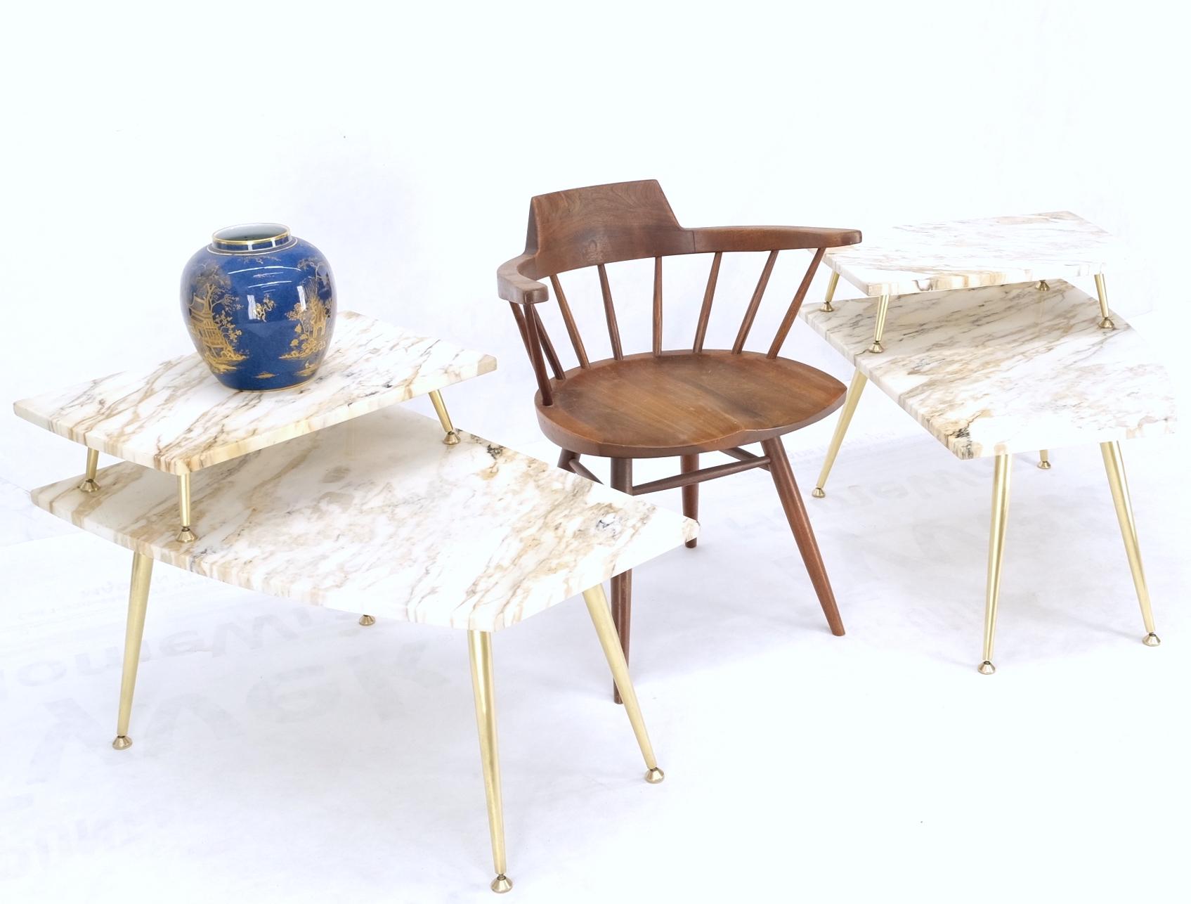 Pair of Asymmetrical Wedge Two Tier Marble Top Tapered Brass Legs Side End Tables.
Base measures 16''H with step measure to 21'' full height.
