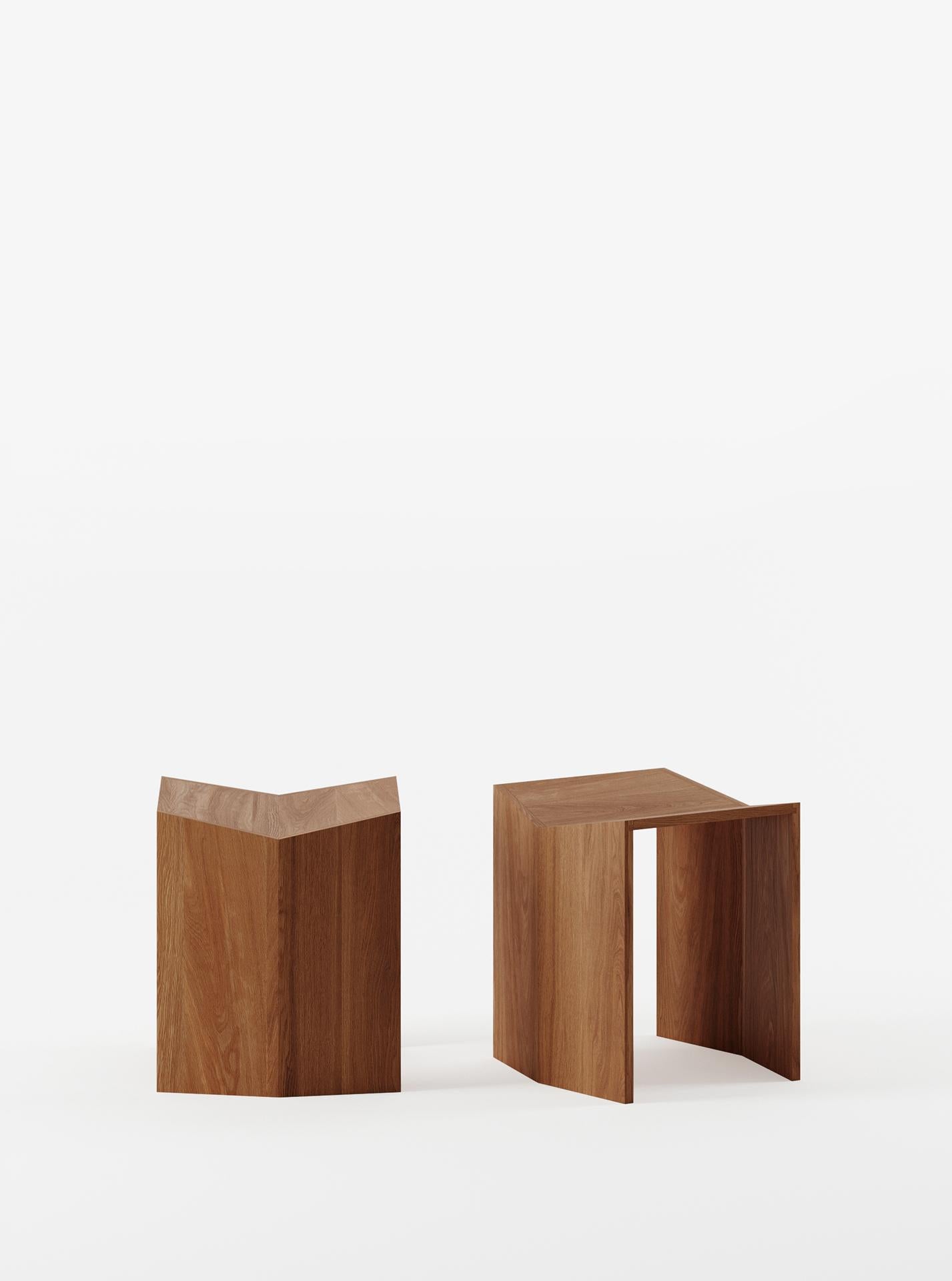 Inspired by classical Greek architecture, the Athens stool uses only two different elements. Made of solid wood, the geometry of the stool comes as a result of its assembly method - three simple 'folds' of the same angle. Put together using a groove