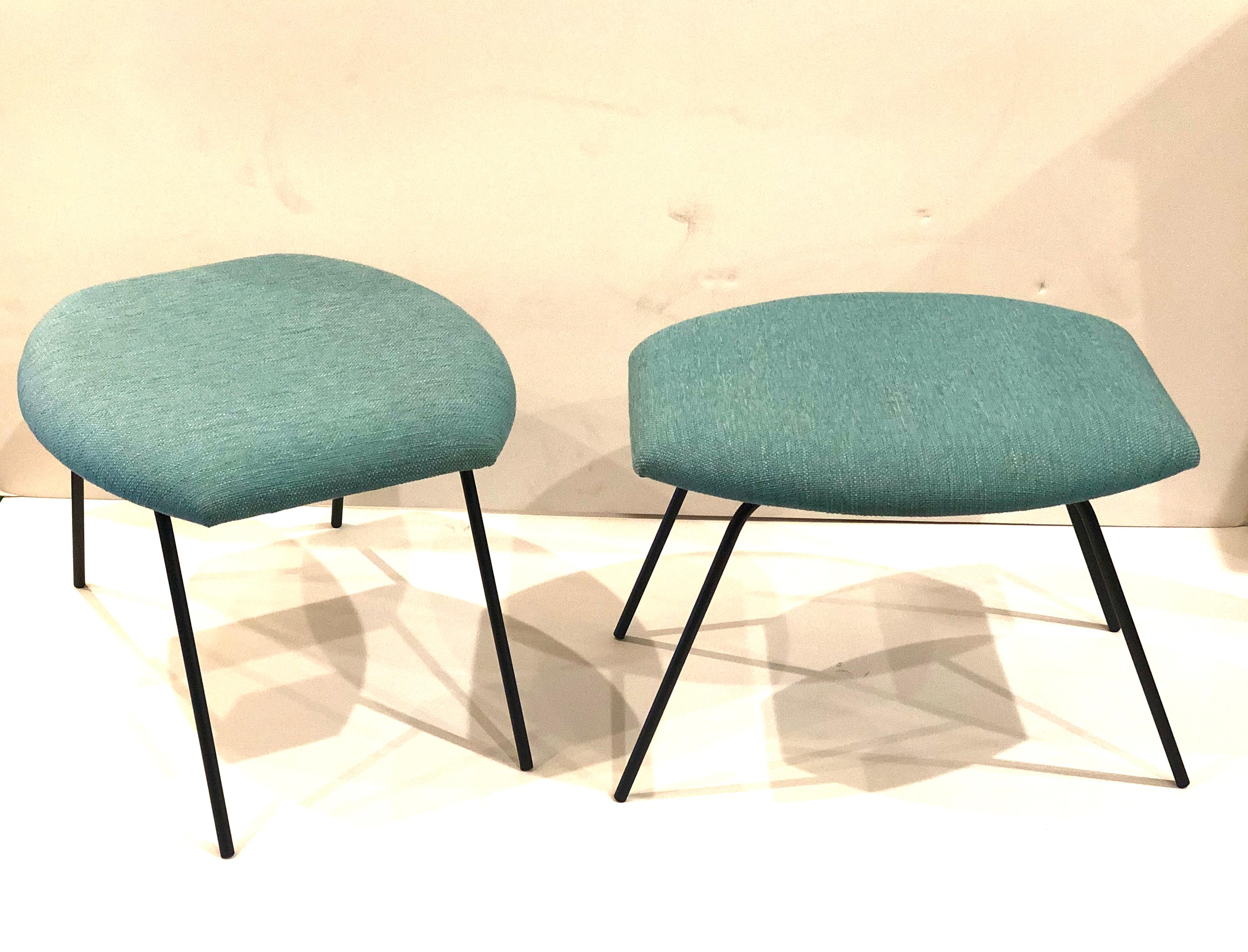 Nice pair of freshly upholstered ottomans, solid iron pipping legs with nice turquoise fabric freshly upholstered and the base its resprayed in flat black.