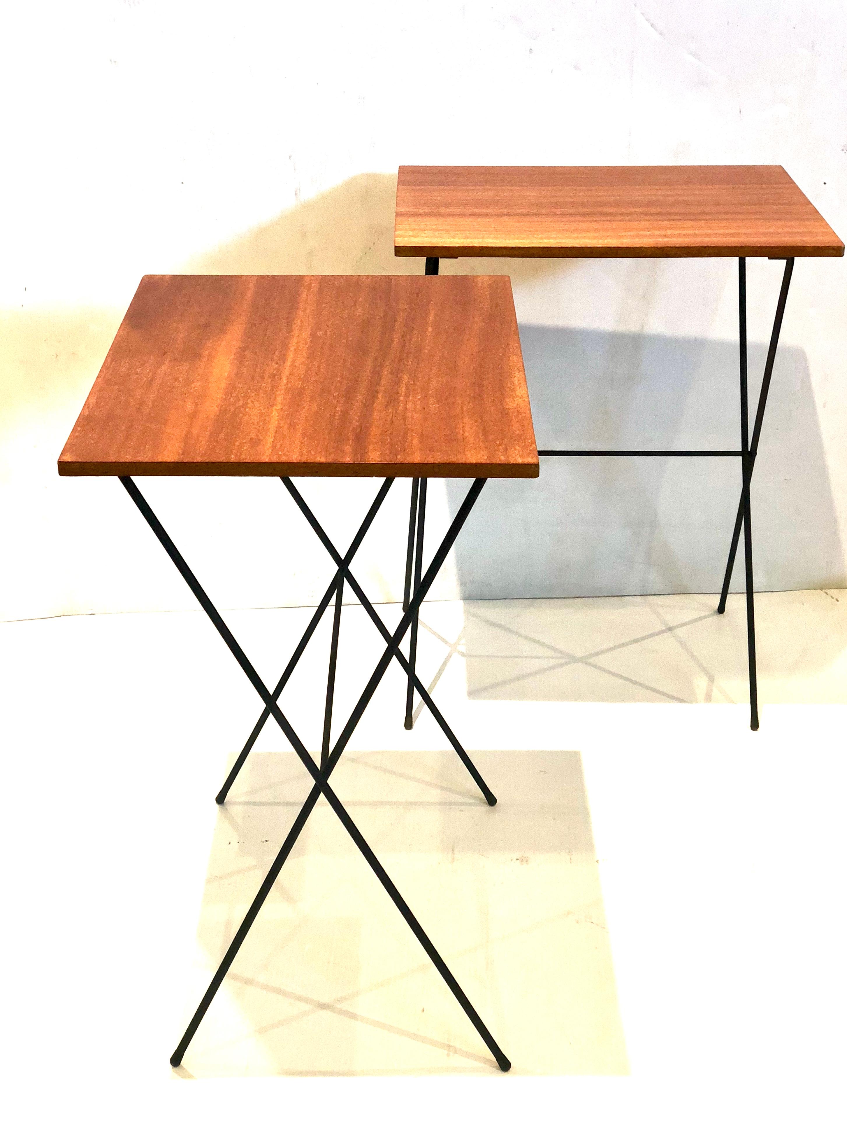 Great pair of mahogany folding TV tray tables, with iron bases freshly refinished versatile and unique.