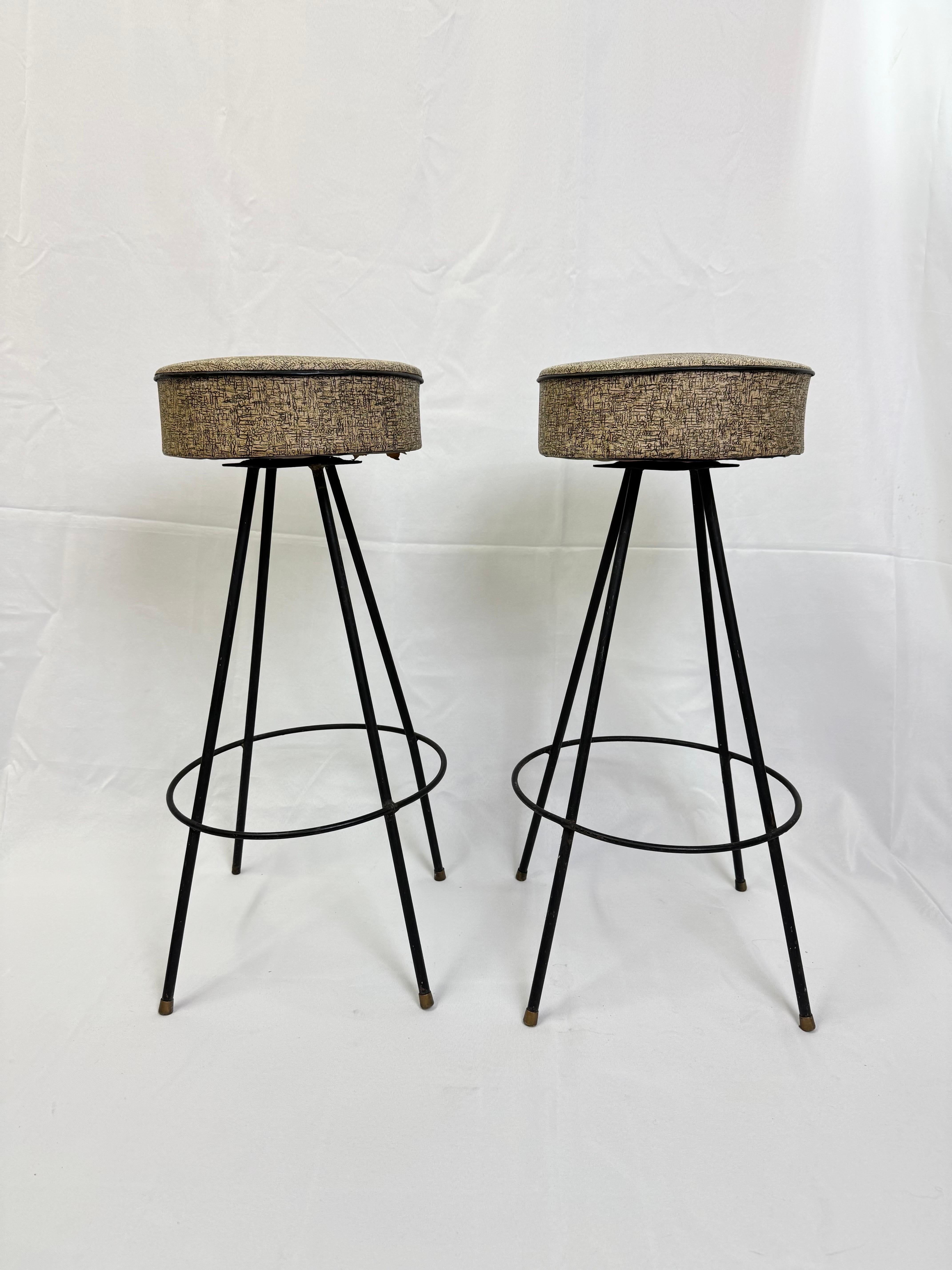 Pair of Atomic Bar stools in the style of Frederic Weinberg . Lightweight and space age in design these beauties spin as well. 