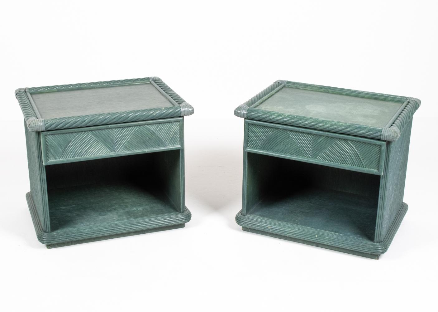 A fabulous pair of Swedish mid-century rattan single-drawer nightstands or end tables, attributed to Dux; no apparent labels. These Palm Beach-eqsue chests feature a geometric and twisted rattan design with great modern flair. An unusual teal-slate