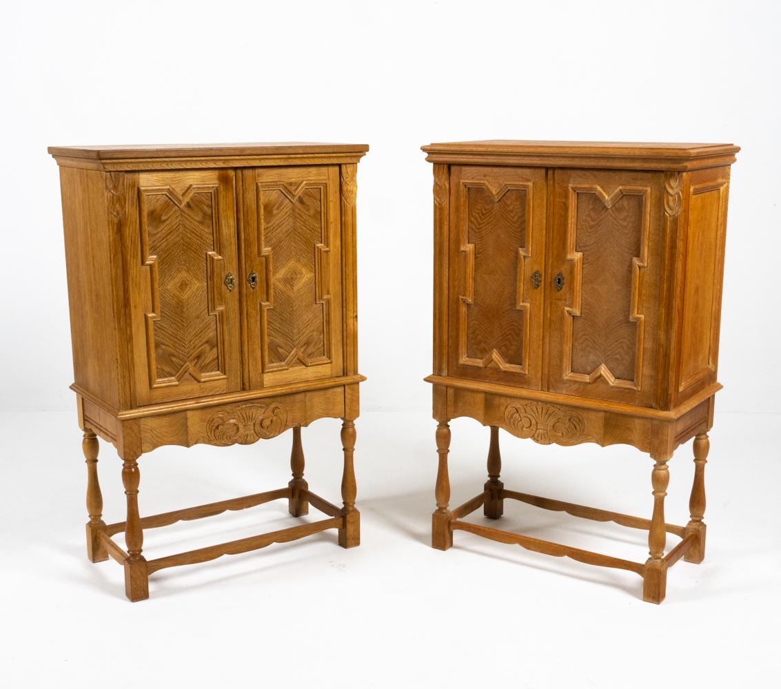 A rare pair of Scandinavian 20th century cabinets, attributed to Danish designer and architect Henning Kjaernulf. While Kjaernulf's life remains shrouded in mystery, more familiar are his ubiquitous contributions to the canon of Danish design.