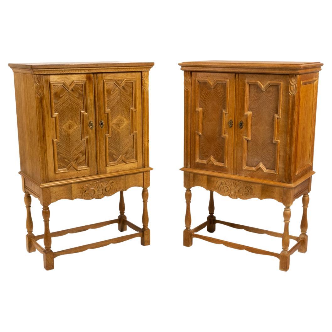 Pair of Attr. Henning Kjaernulf Carved Oak Cabinets