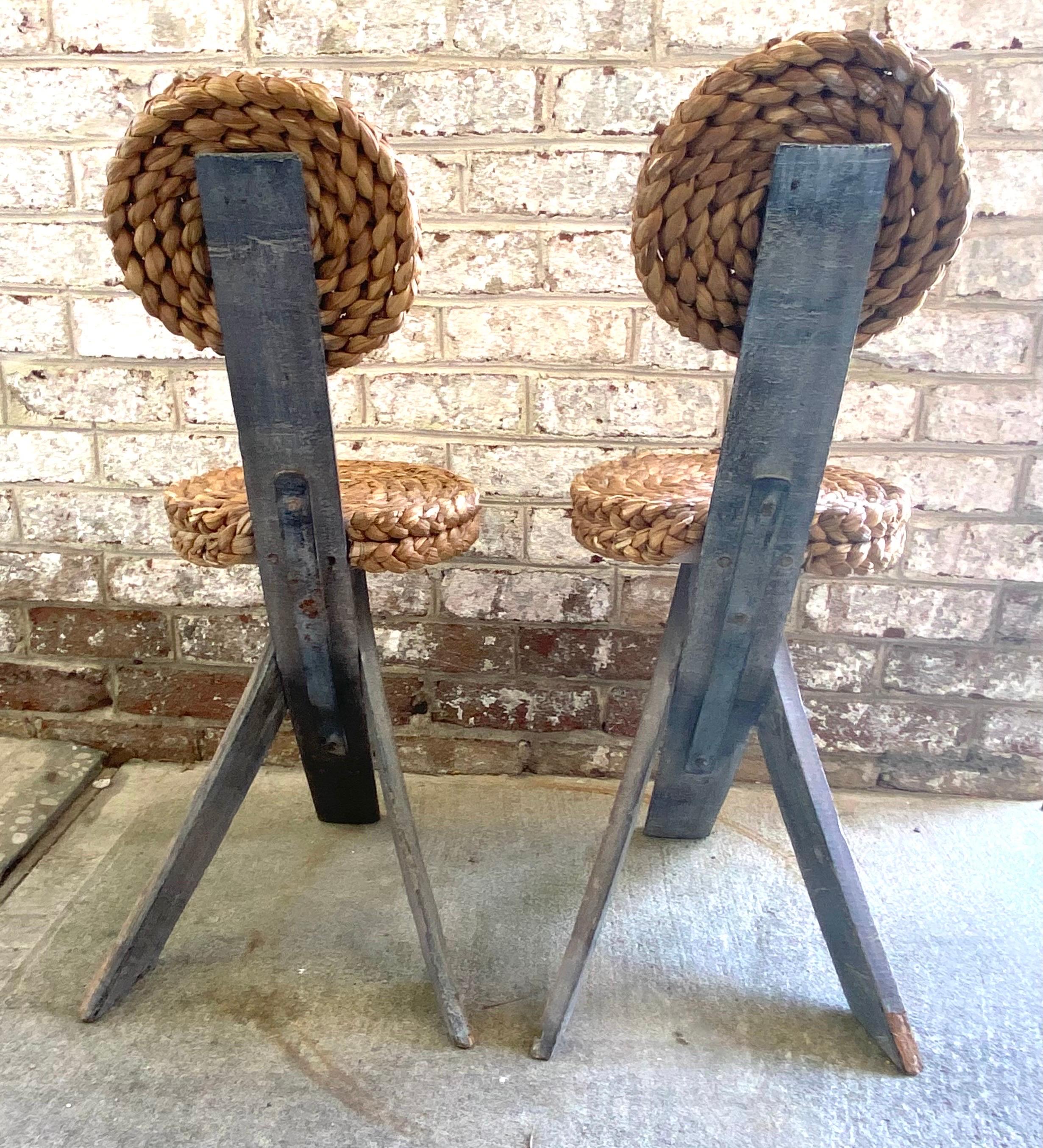 20th Century Pair of Audoux Minet Tripod Base Chairs with Abaca Seat and Back For Sale