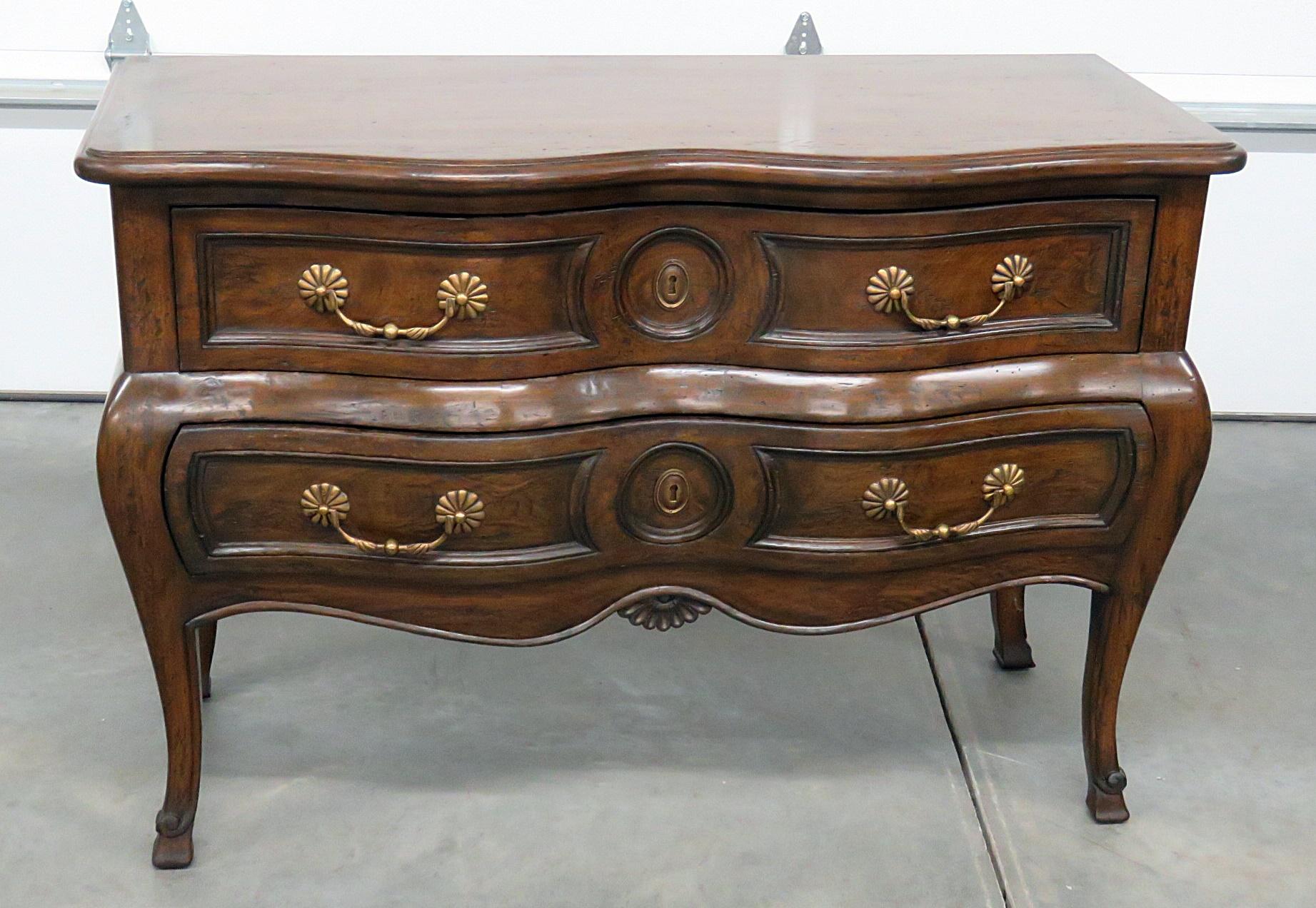 Pair of Auffray 2-drawer bombe commodes.